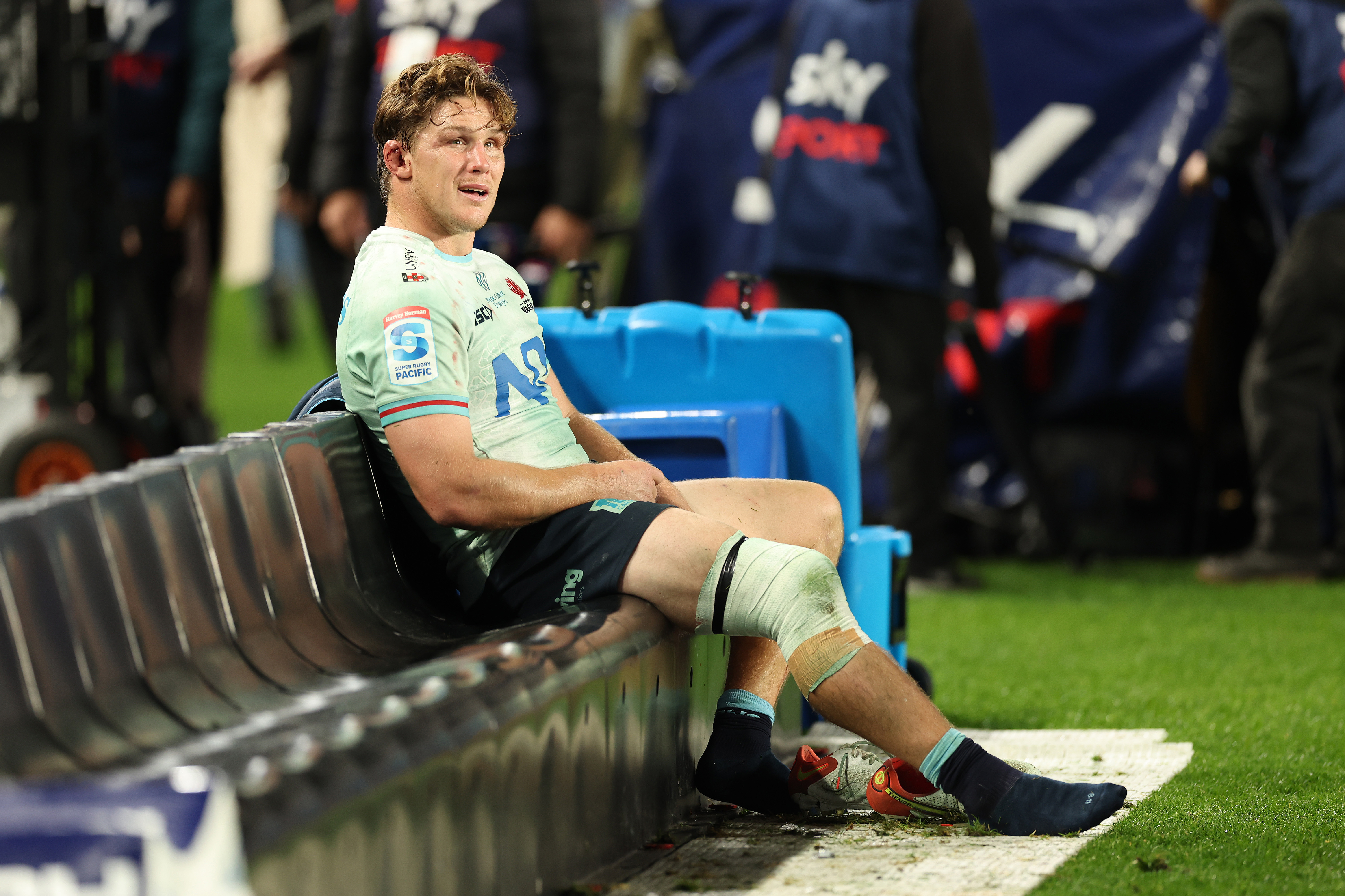 Michael Hooper sits alone following the Super Rugby Pacific quarter-final match between Blues and Waratahs at Eden Park.