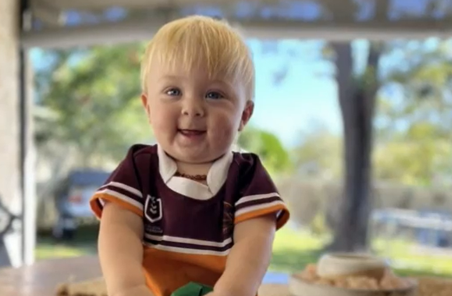 T﻿he father of a three-year-old boy who died in the foyer of a Queensland police station following a car crash will remain behind bars after being refused bail.
