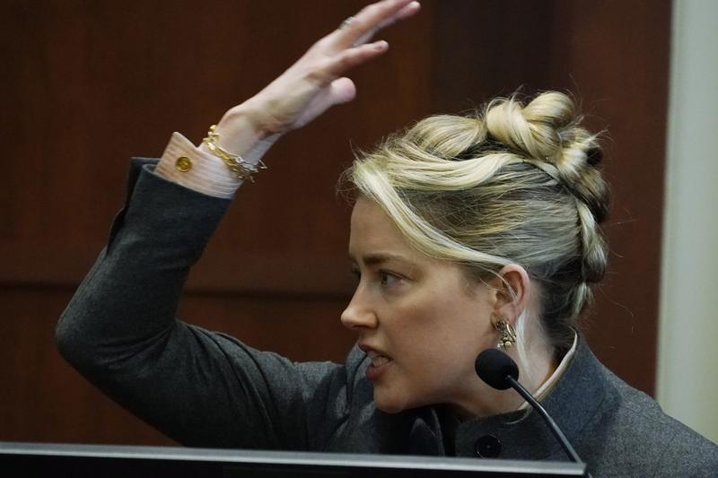 Actor Amber Heard testifies in the courtroom at the Fairfax County Circuit Courthouse in Fairfax, Virginia on Monday, May 16, 2022.