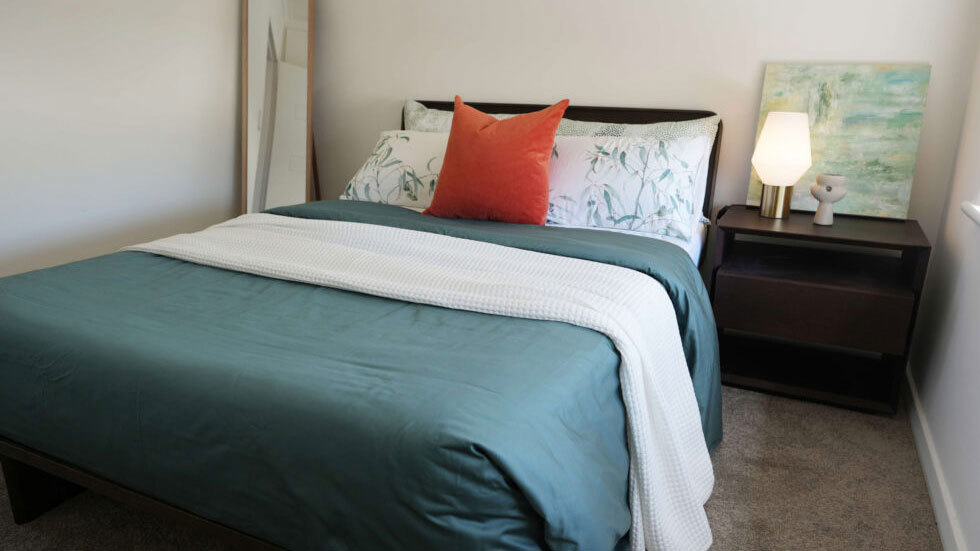 Small touches, like placing just one bedside table in the bedroom, can make a difference for women escaping violence.