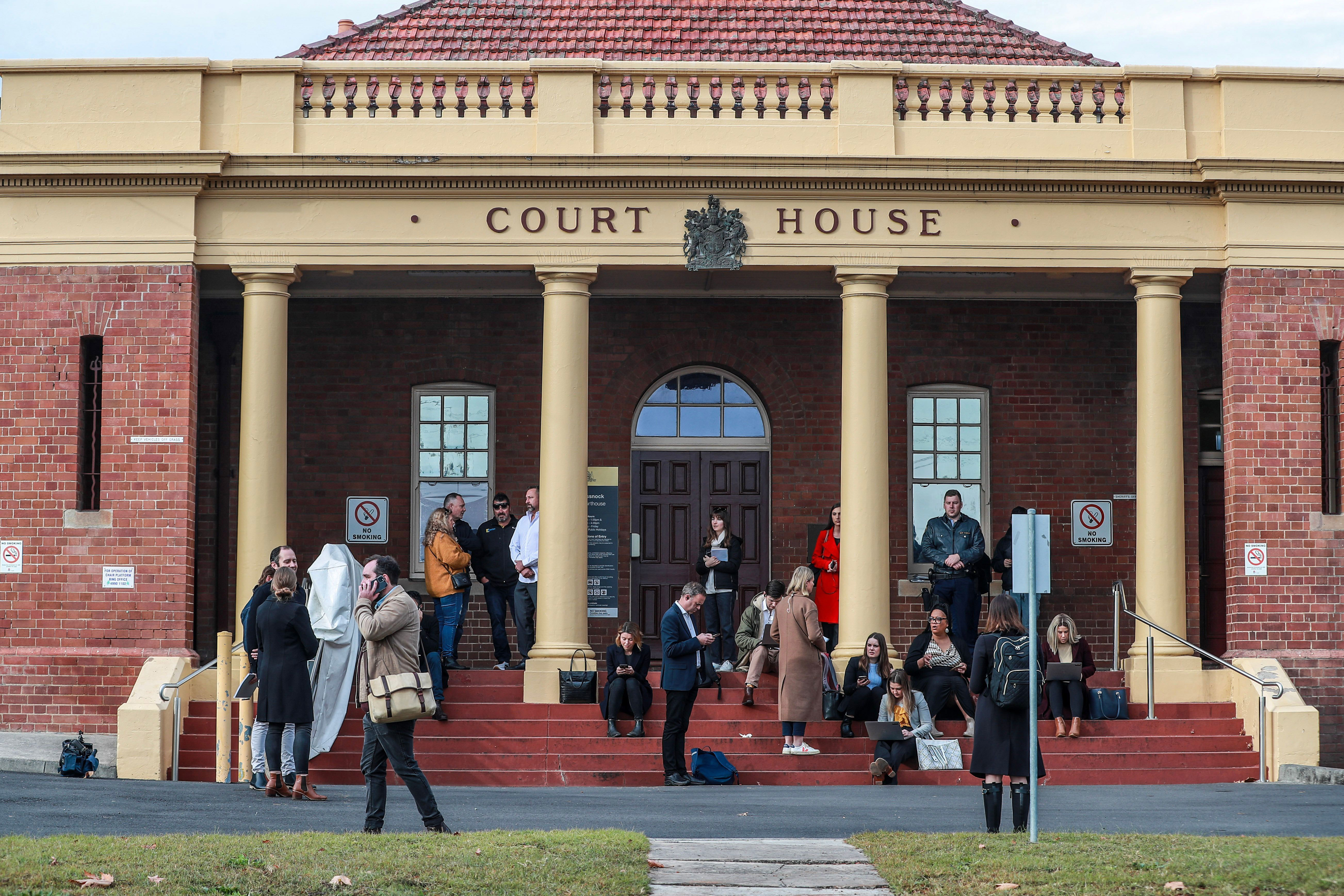 Media wait outside Cessnock Court House.