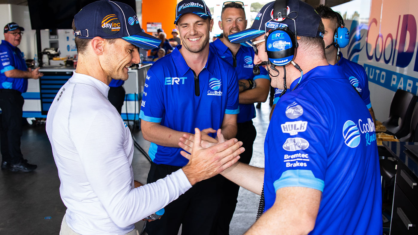 Tim Slade and team boss Tim Blanchard after Slade qualified second for the opening race of the Supercars season.