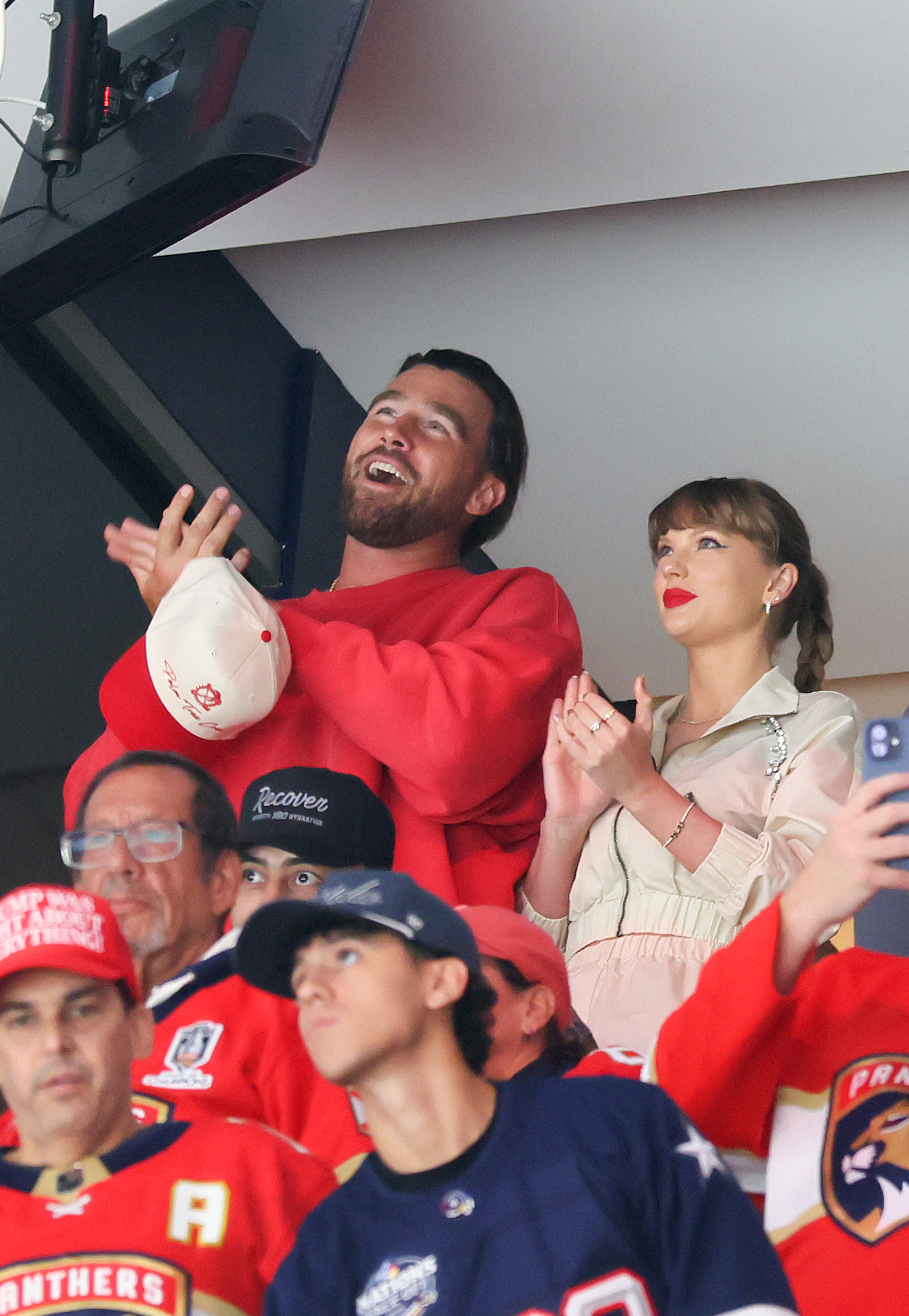 SUNRISE, FLORIDA - JUNE 12: Travis Kelce, left, and Taylor Swift react as the Edmonton Oilers and the Florida Panthers play during the first period in Game Four of the 2025 Stanley Cup Final at Amerant Bank Arena on June 12, 2025 in Sunrise, Florida. (Photo by Bruce Bennett/Getty Images)