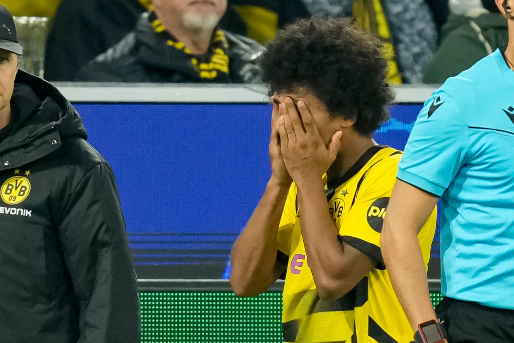 Karim Adeyemi of Borussia Dortmund has to leave the field injured.