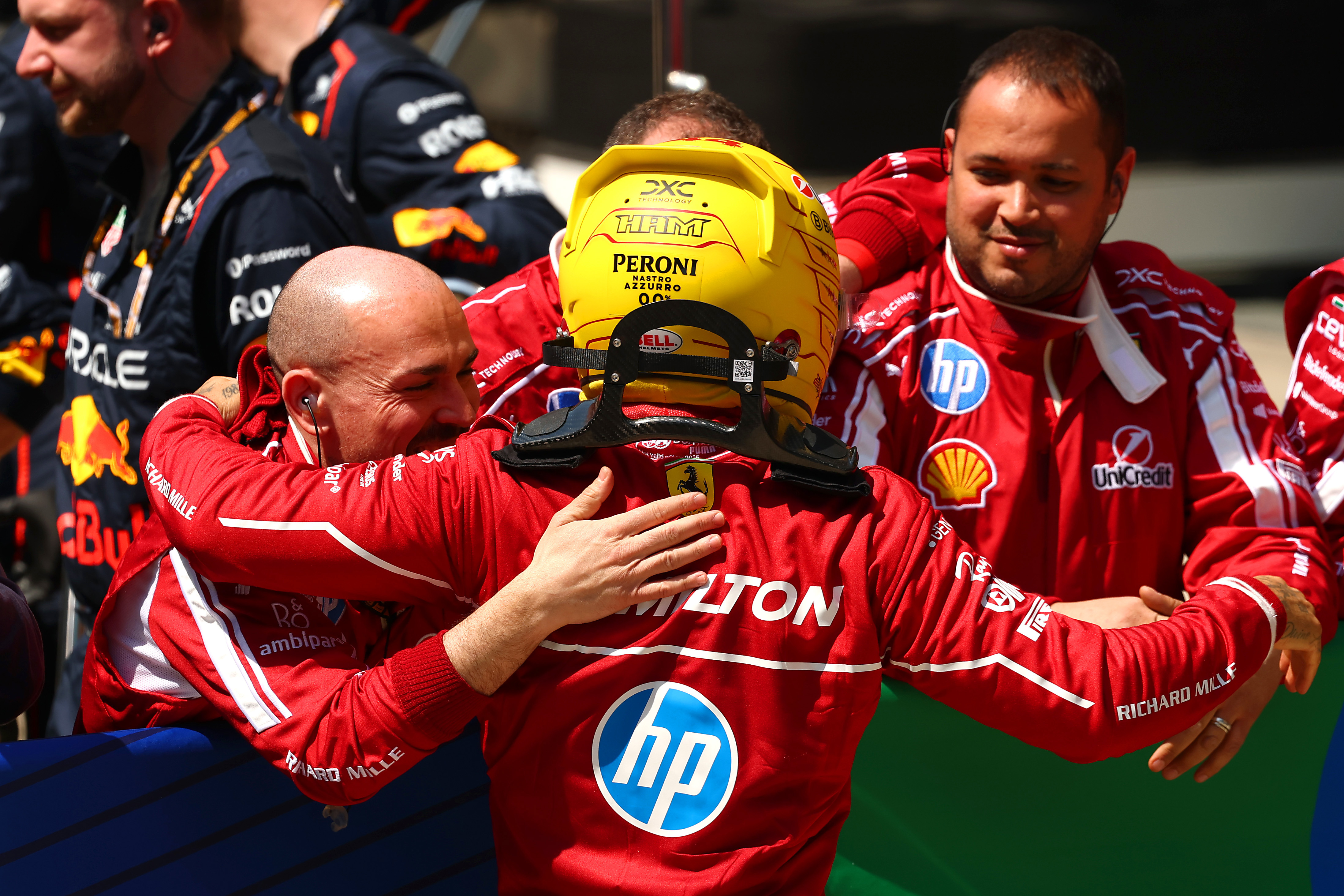 Sprint winner Lewis Hamilton of Great Britain and Scuderia Ferrari celebrates in parc ferme with his team during the Sprint ahead of the F1 Grand Prix of China at Shanghai International Circuit on March 22, 2025 in Shanghai, China. (Photo by Clive Rose/Getty Images)