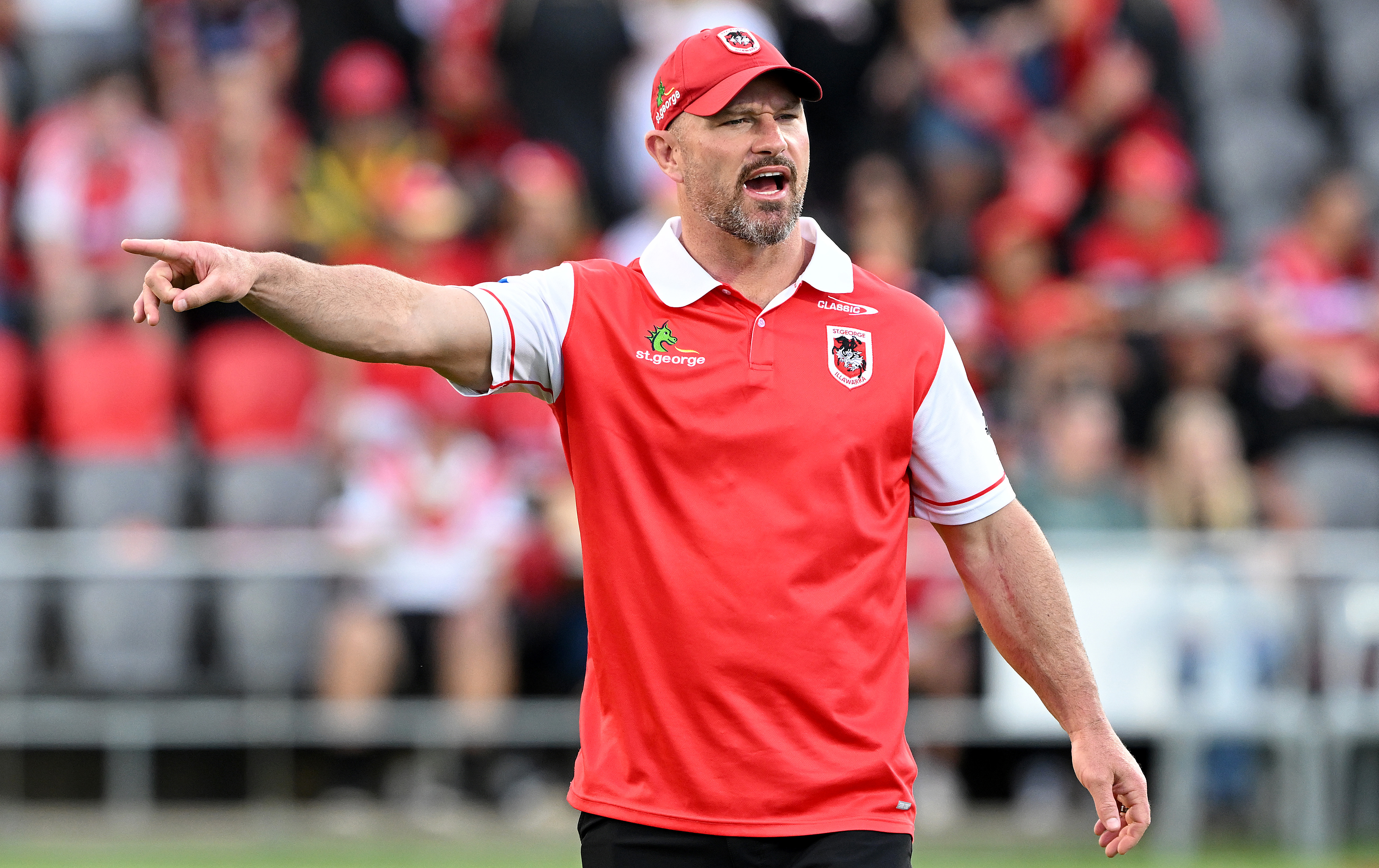 Dean Young assistant coach of the Dragons instructs the players during the warm up before the round two NRL match between the Dolphins and St George Illawarra Dragons at Kayo Stadium, on March 17, 2024, in Brisbane, Australia. (Photo by Bradley Kanaris/Getty Images)