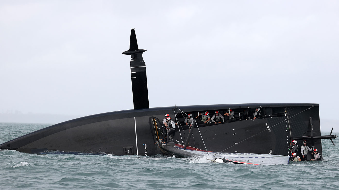  American Magic capsizes in race two against Prada Luna Rossa during the 2021 PRADA Cup Round Robins on Auckland Harbour on January 17, 2021 in Auckland,