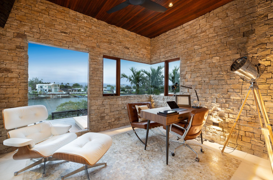 Property for sale in Benowa Waters, Queensland, with fossil-infused limestone flooring.