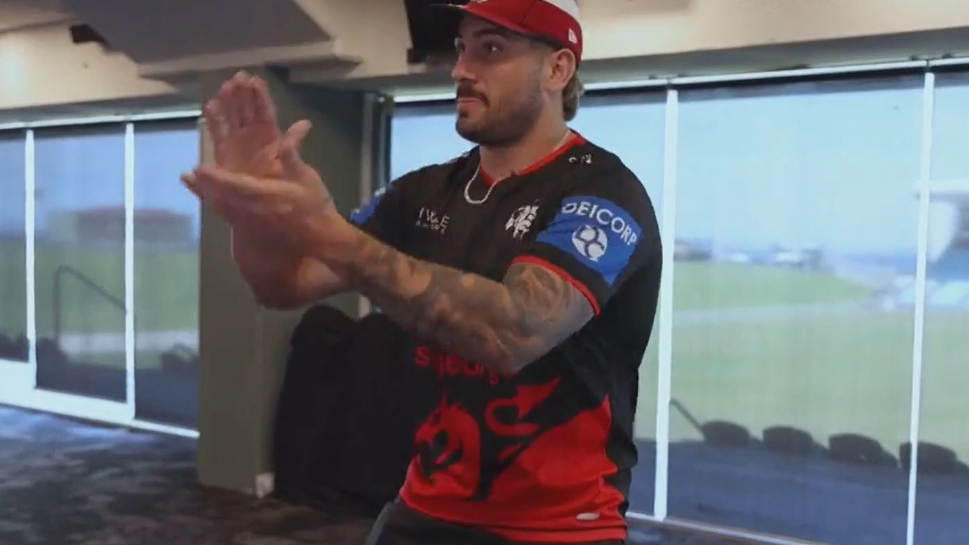 Dragons star Jack Bird's signal of a brown paper bag has left Roosters boss Nick Politis seeing red