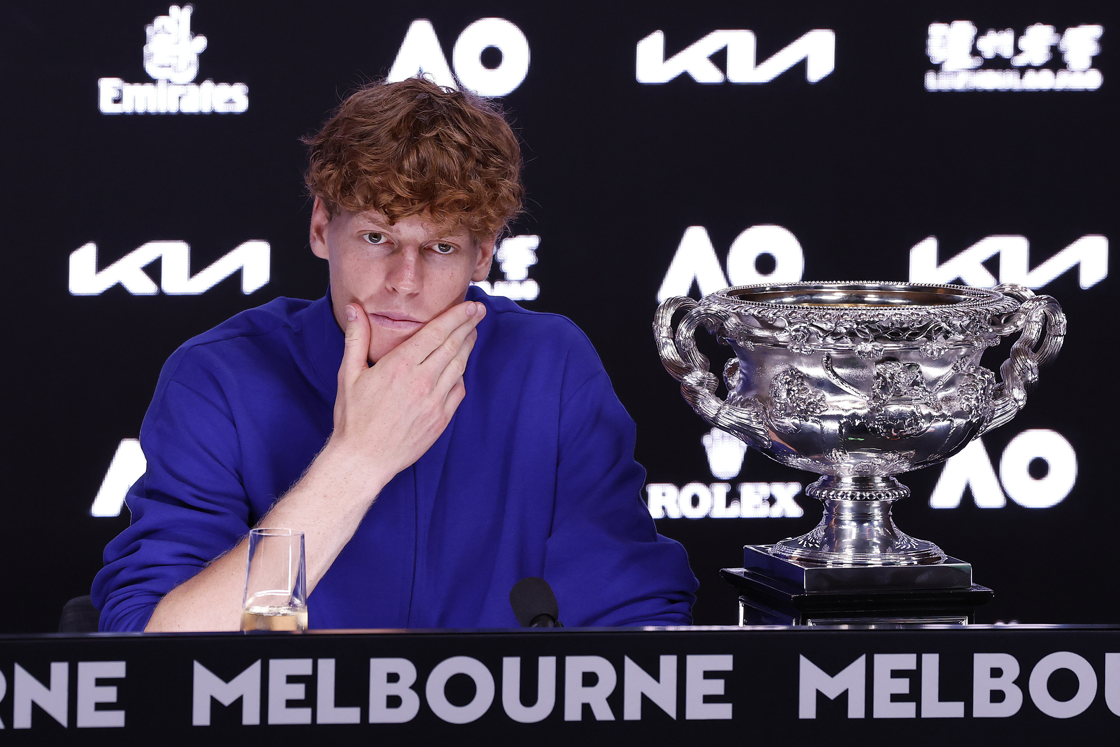 Men's singles champion Jannik Sinner attends a press conference.