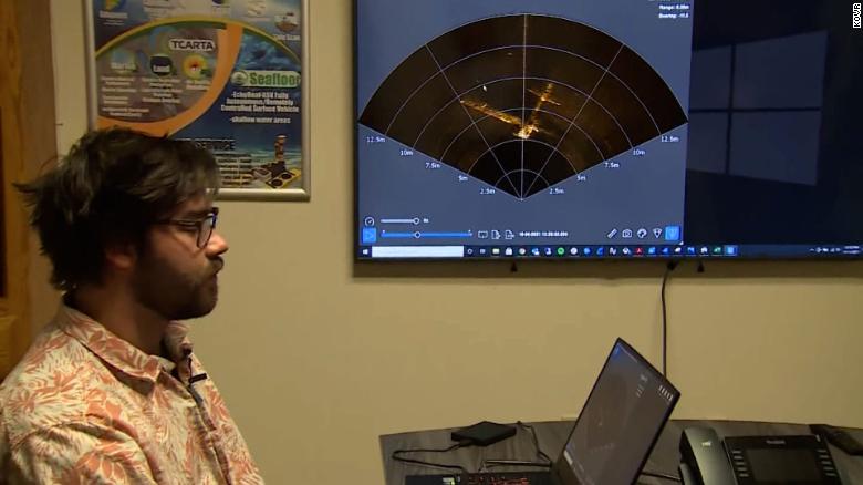 Jeff Riley of Seafloor Systems displays a sonar image of the the airplane wreckage in Folsom Lake.