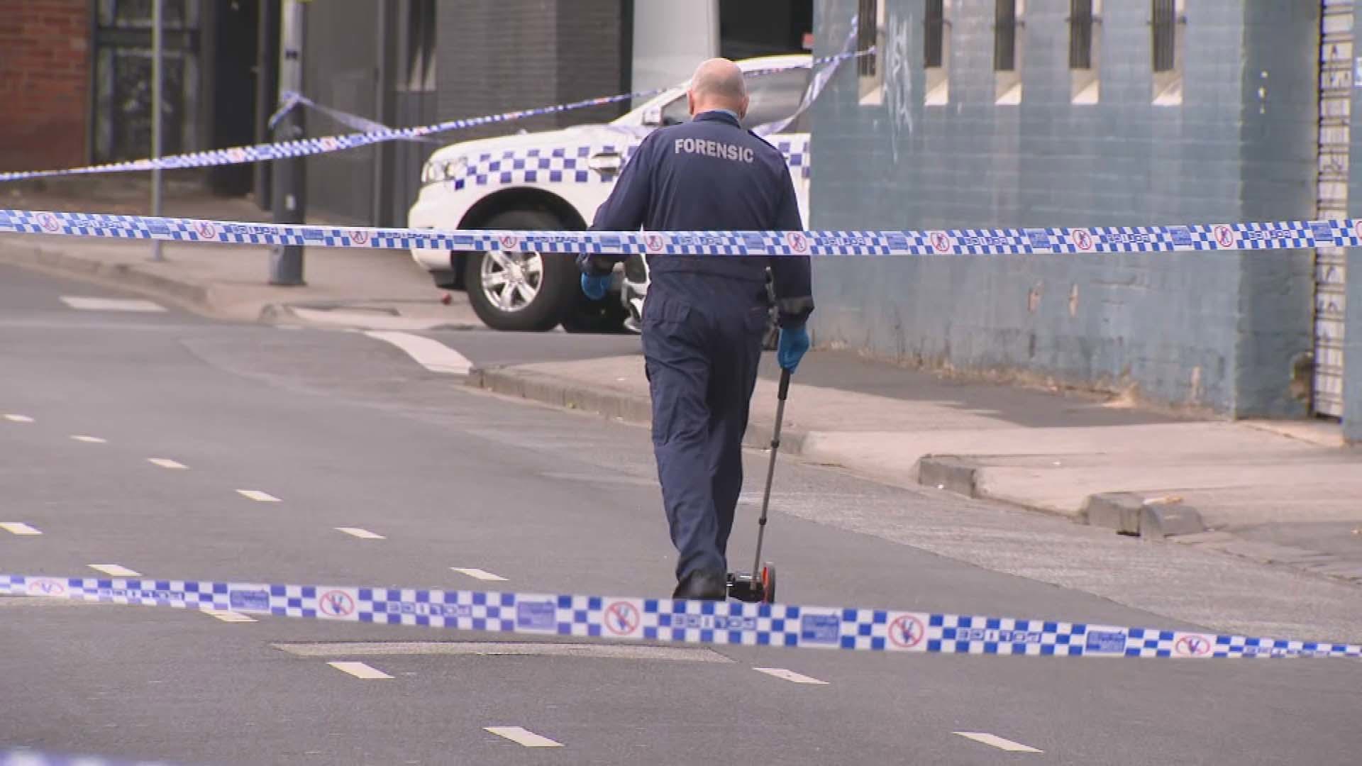 A father of six with suspected bikie links has been stabbed to death on Melbourne's popular Chapel Street.