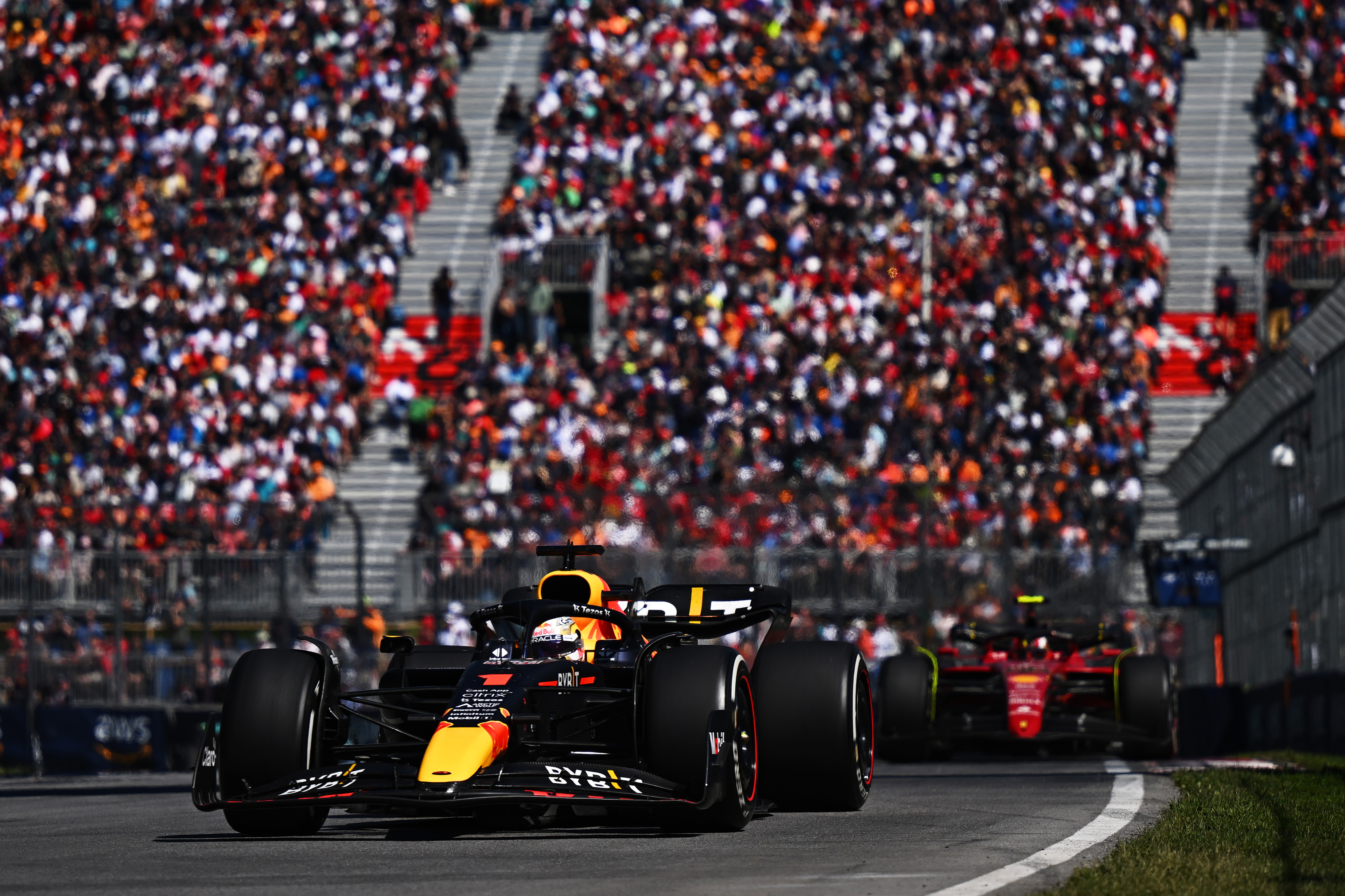 Max Verstappen leads Carlos Sainz during the Canadian Grand Prix in Montreal. Photo: Clive Mason