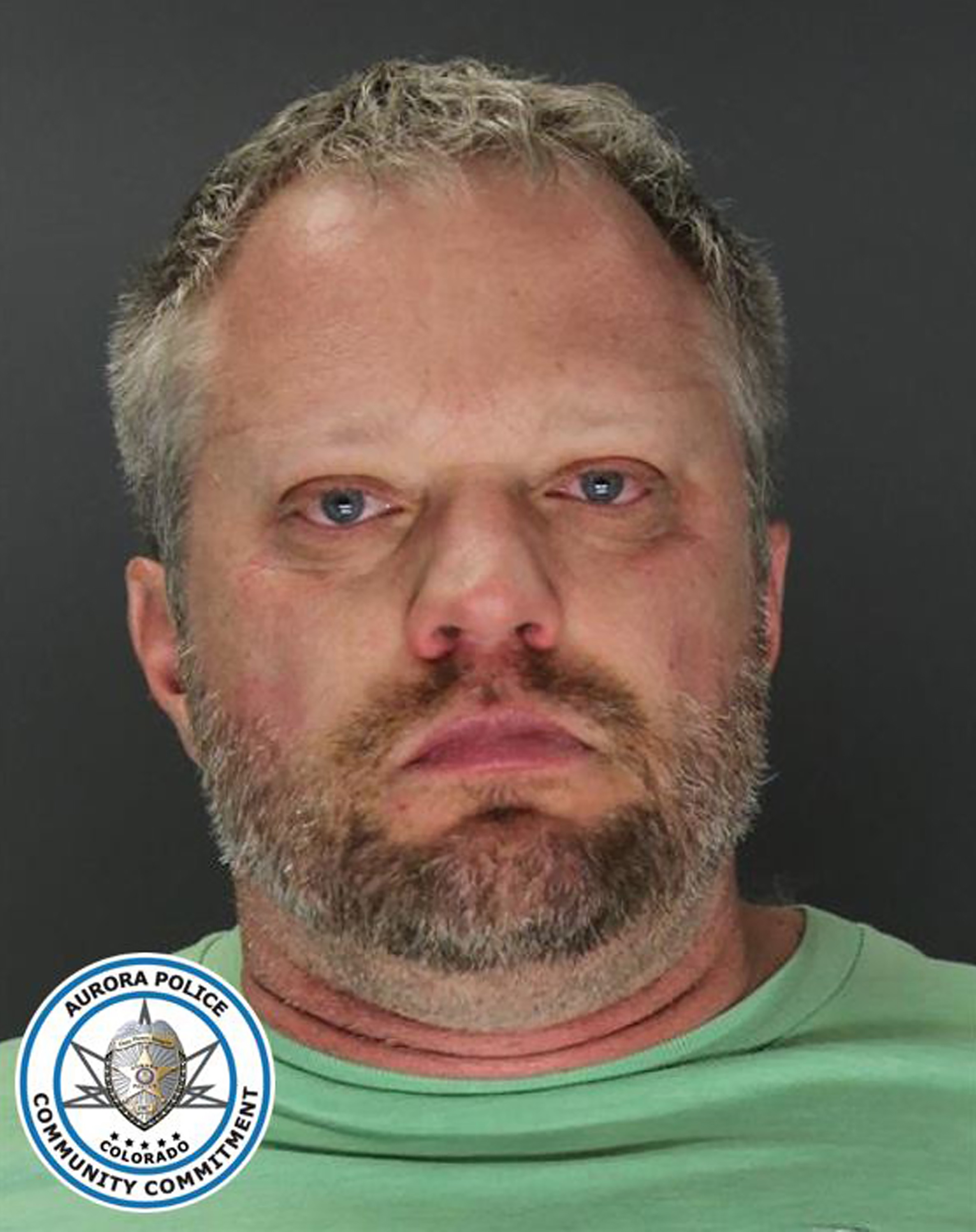 This undated booking photo provided by the Aurora Police Department shows James Craig.