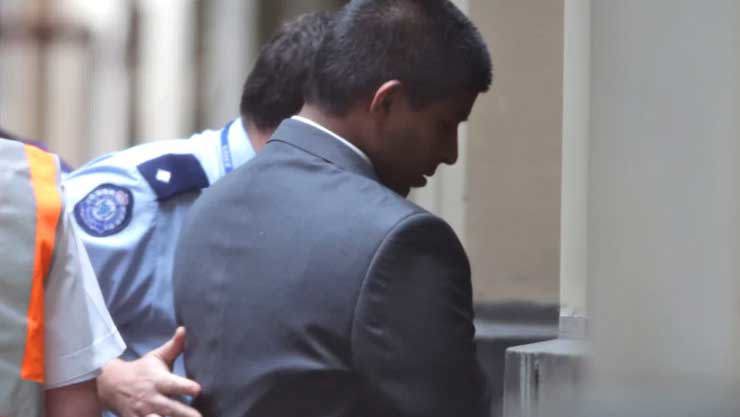 James Stoneham is led into the Supreme Court in 2013.