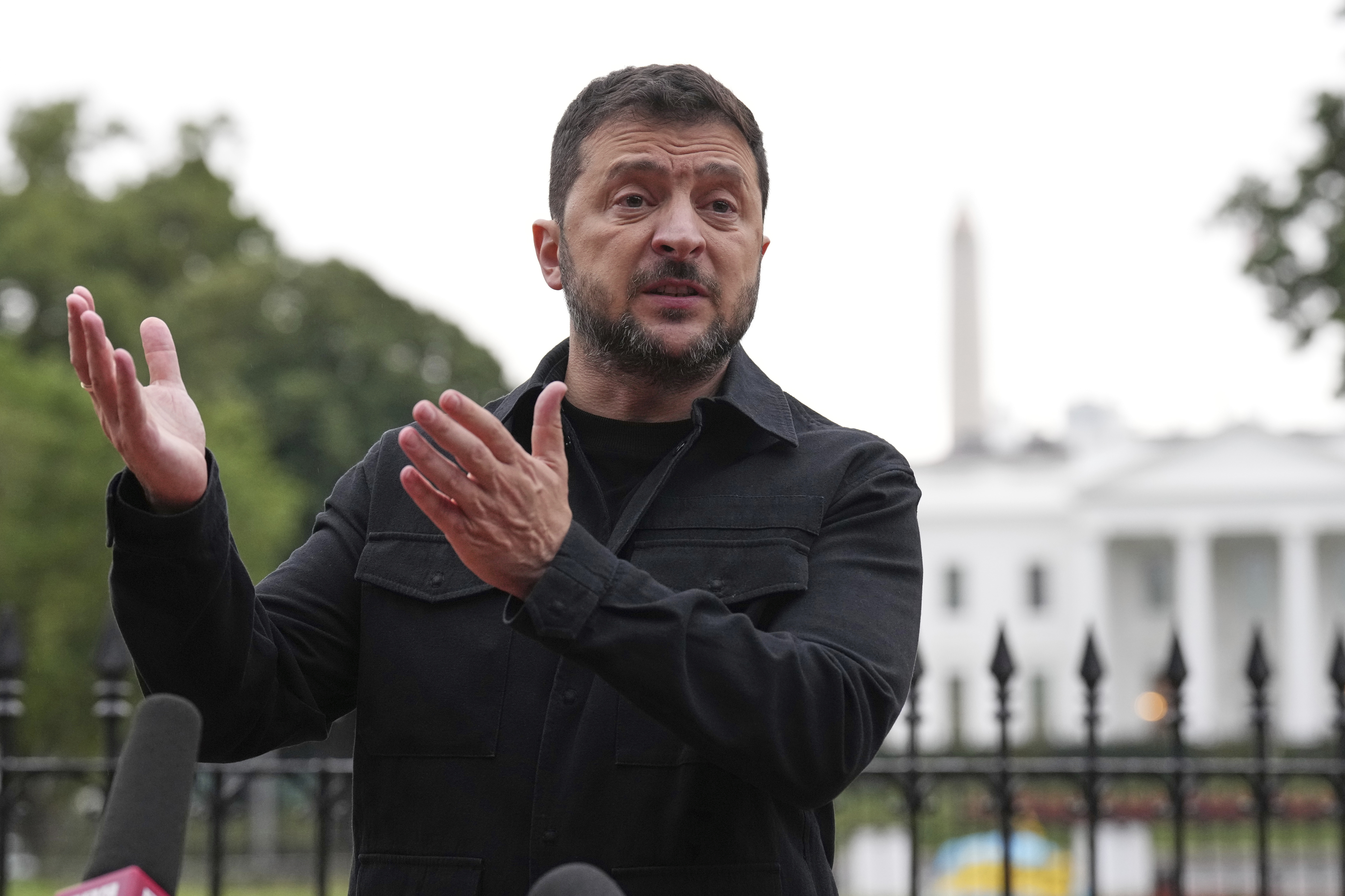 Ukraine's President Volodymyr Zelenskyy speaks in Lafayette Park, across from the White House, after meeting with President Donald Trump and European leaders Monday, Aug. 18, 2025, in Washington.
