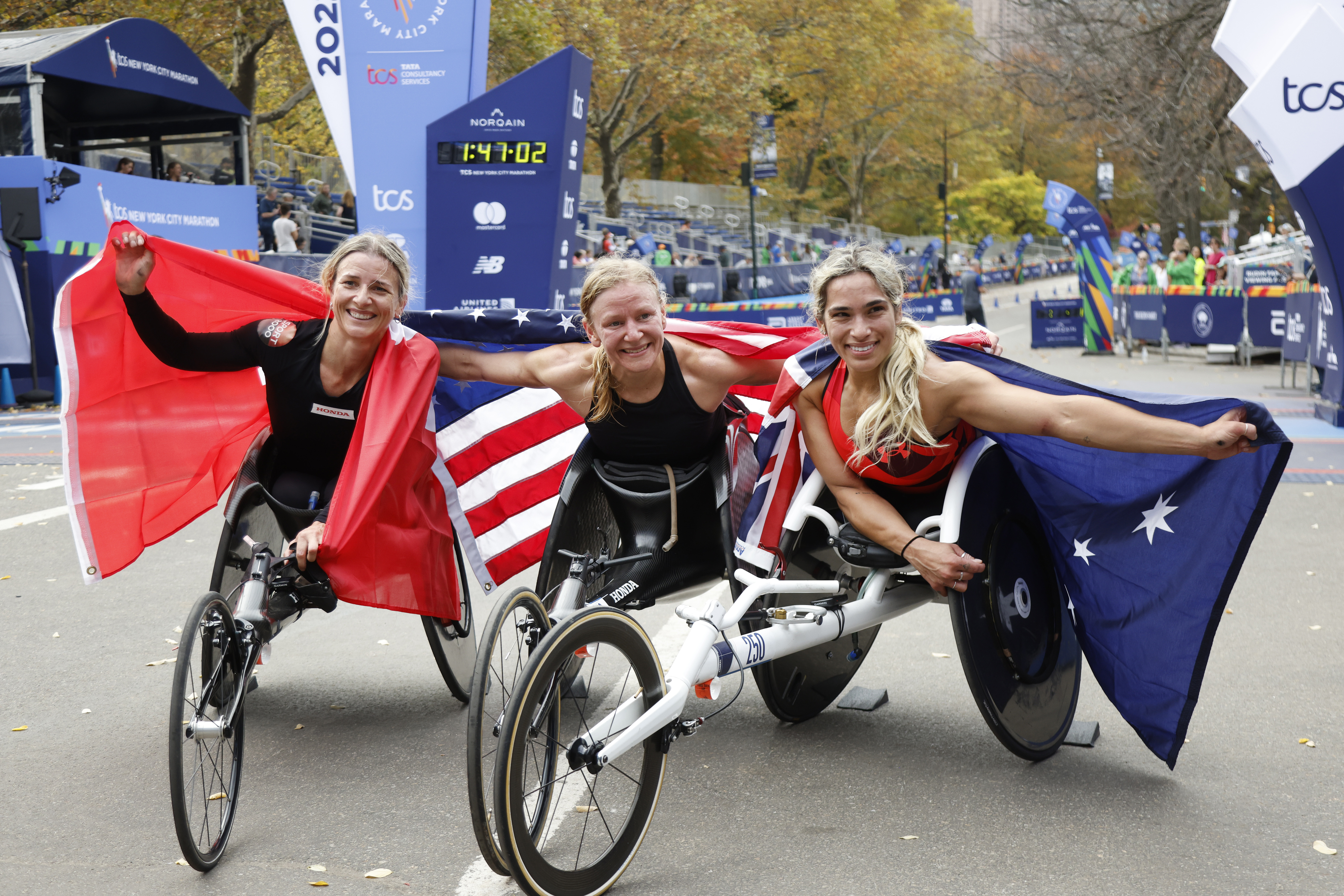 Madison de Rozario (L) completes the New York City Marathon.