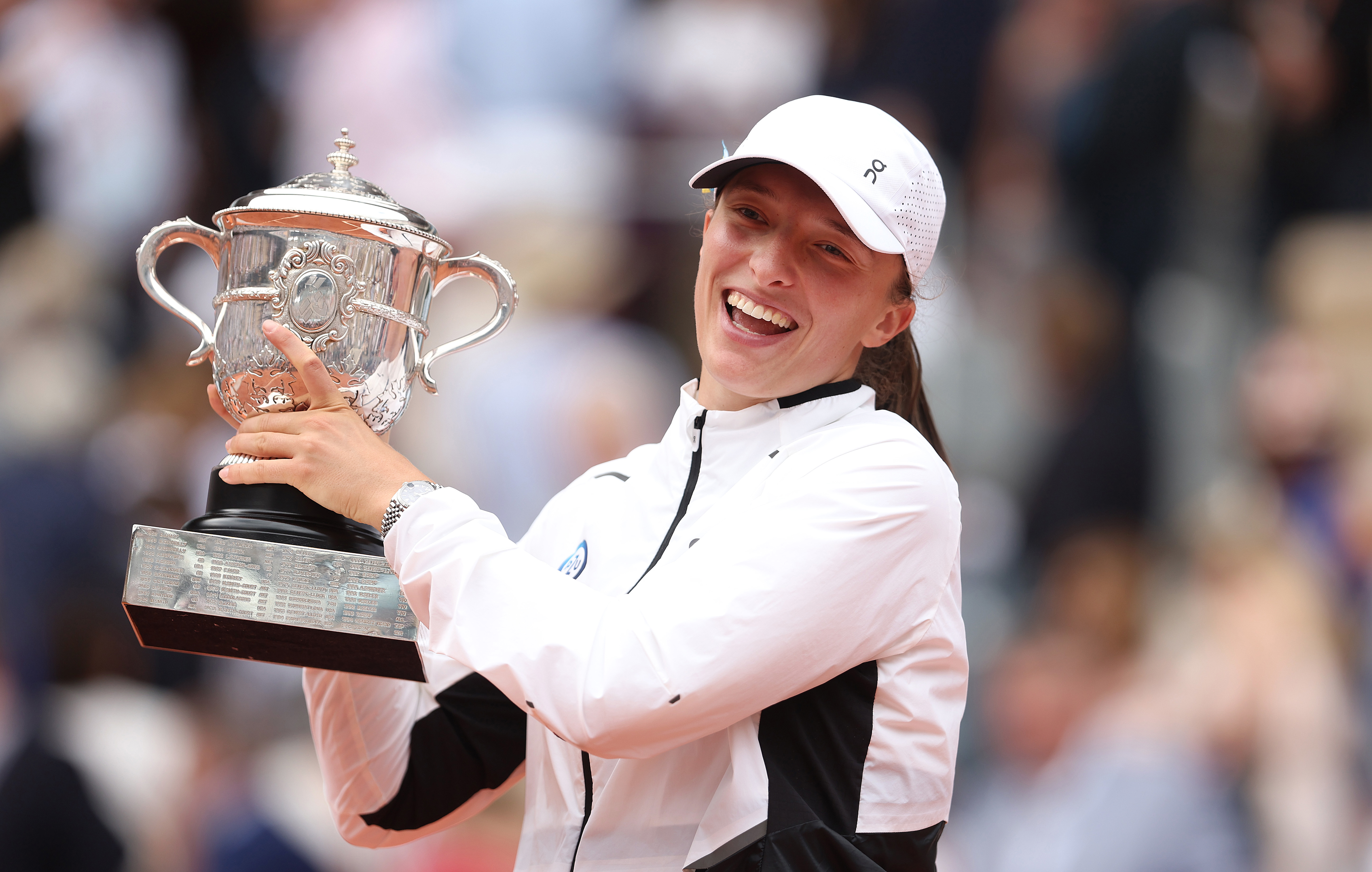 Iga Swiatek of Poland celebrates after victory against Karolina Muchova of Czech Republic at the French Open.