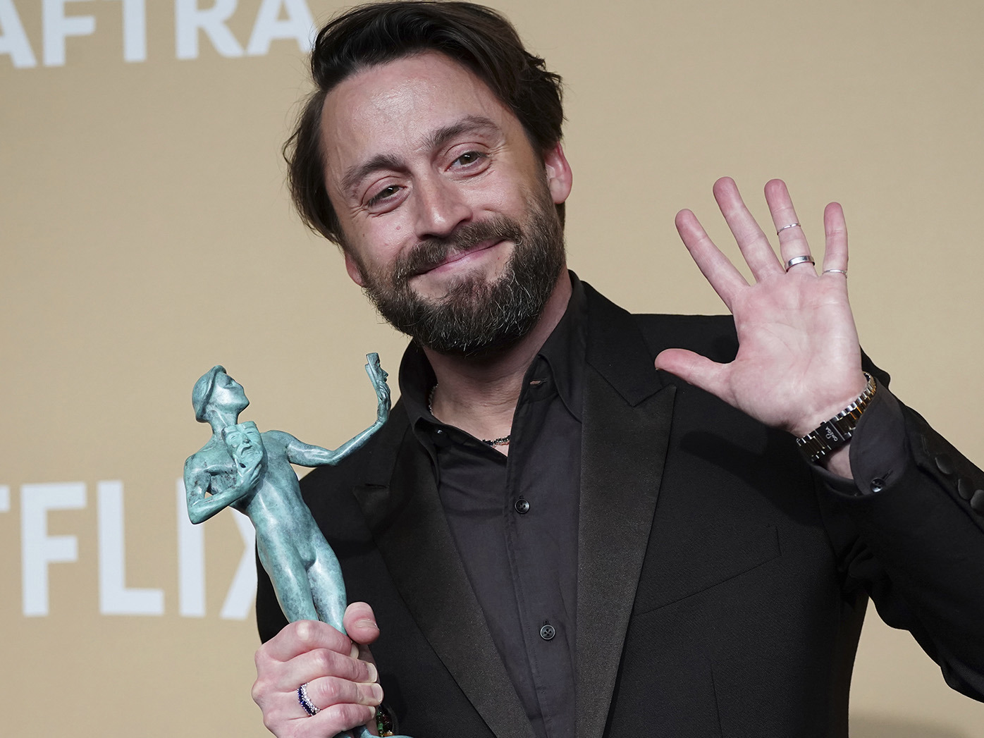 Kieran Culkin with his SAG Award for outstanding performance by a male actor in a supporting role for A Real Pain on February 23, 2025, at the Shrine Auditorium in Los Angeles. 