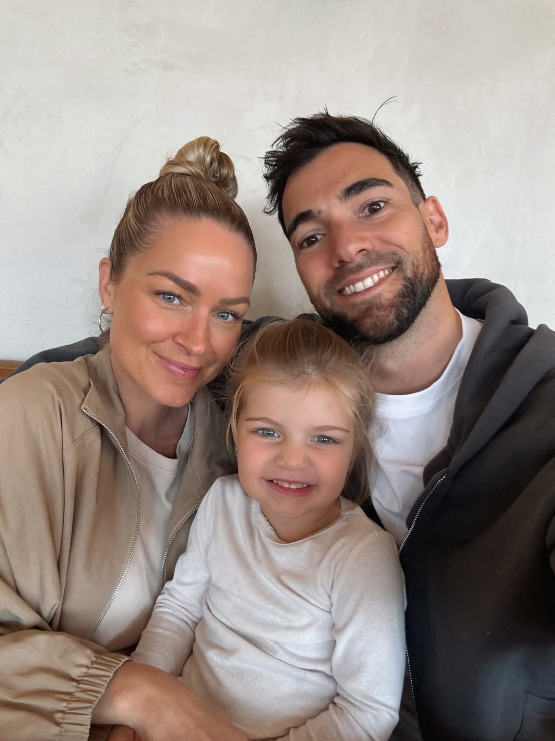 Renae Ayris with Andrew Papadopoulos and their daughter Harper