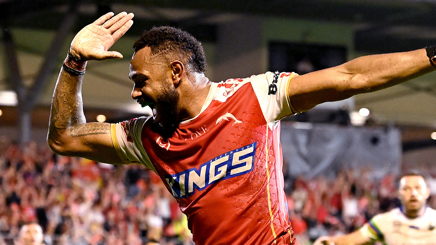 Hamiso Tabuai-Fidow of the Dolphins celebrates after scoring against Canberra.