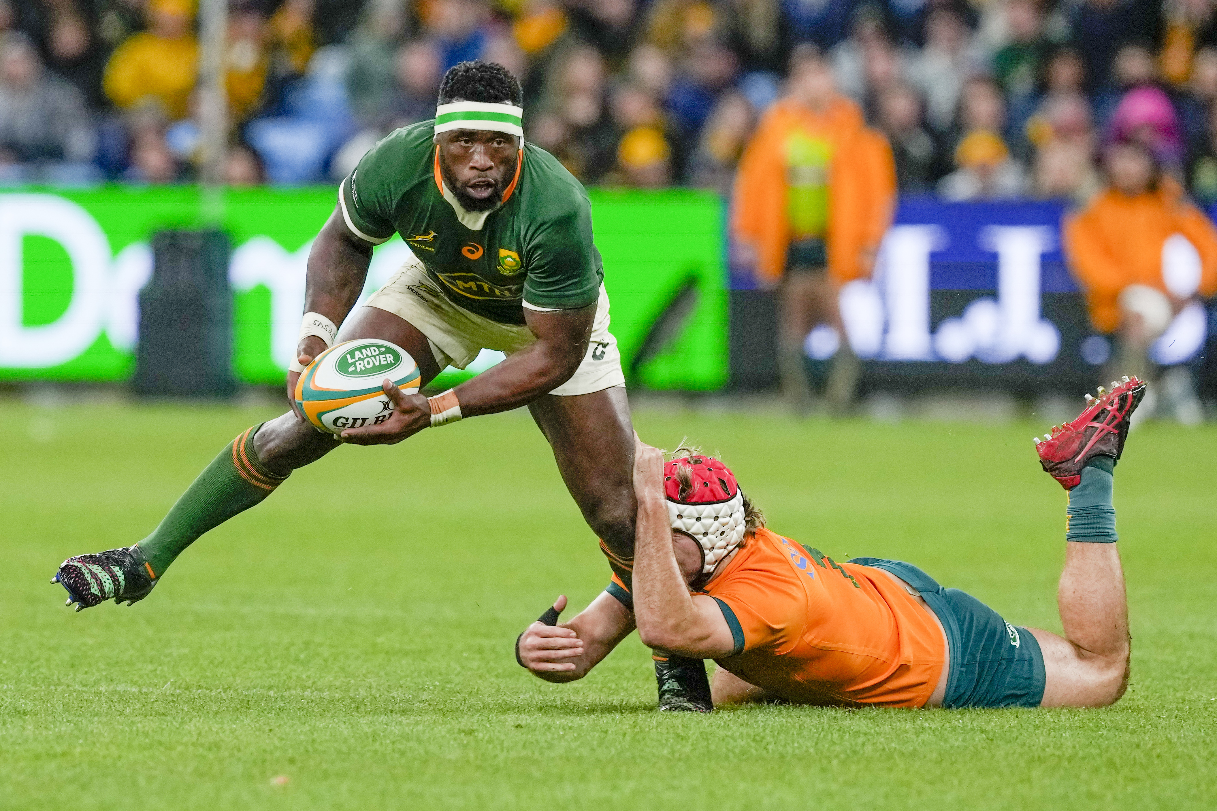 South Africa's Siya Kolisi runs at the defense during the second Rugby Championship test match between the Wallabies and the Springboks in Sydney.