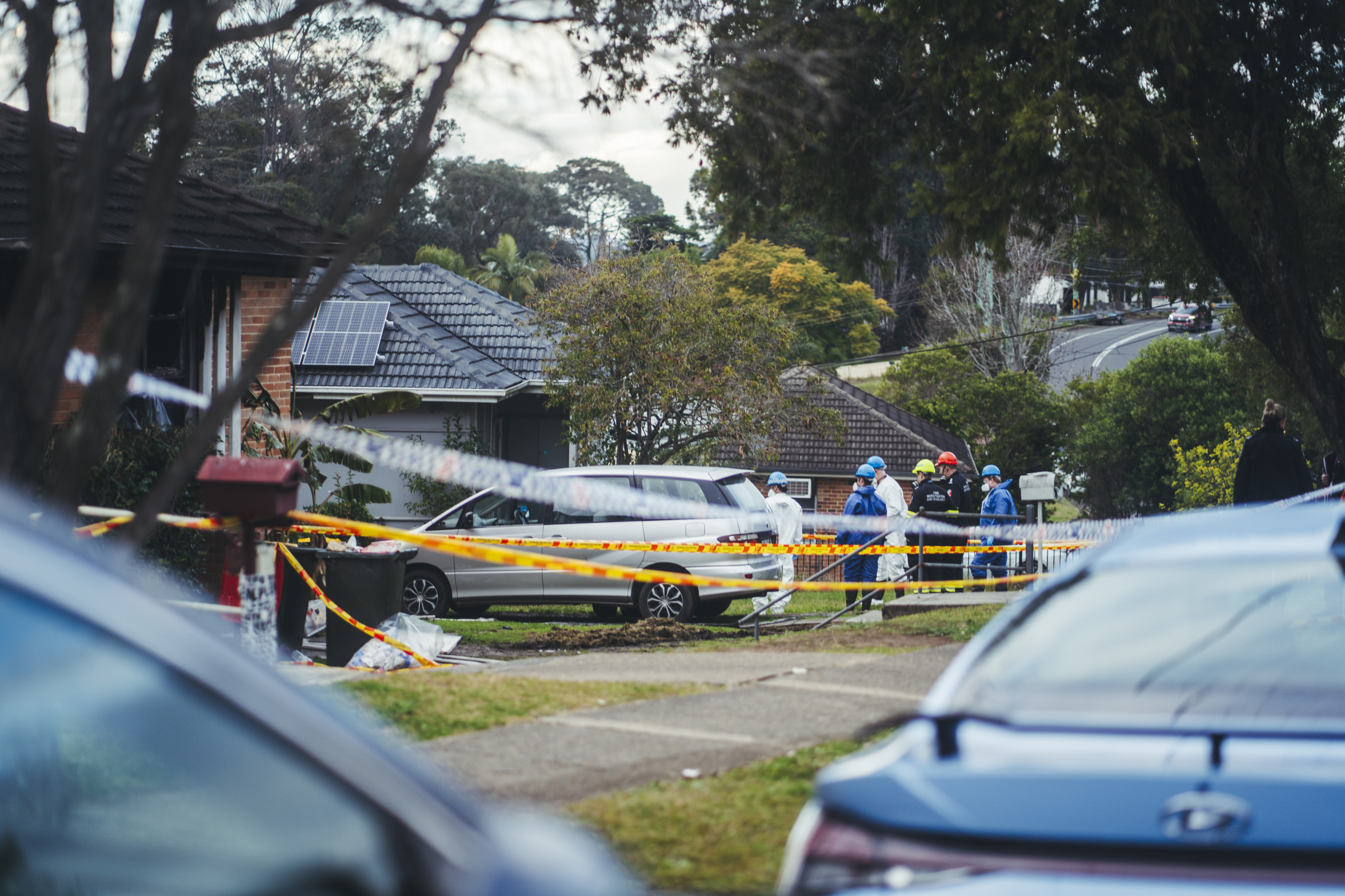 Police and forensic crews at the scene of the Lalor Park blaze.