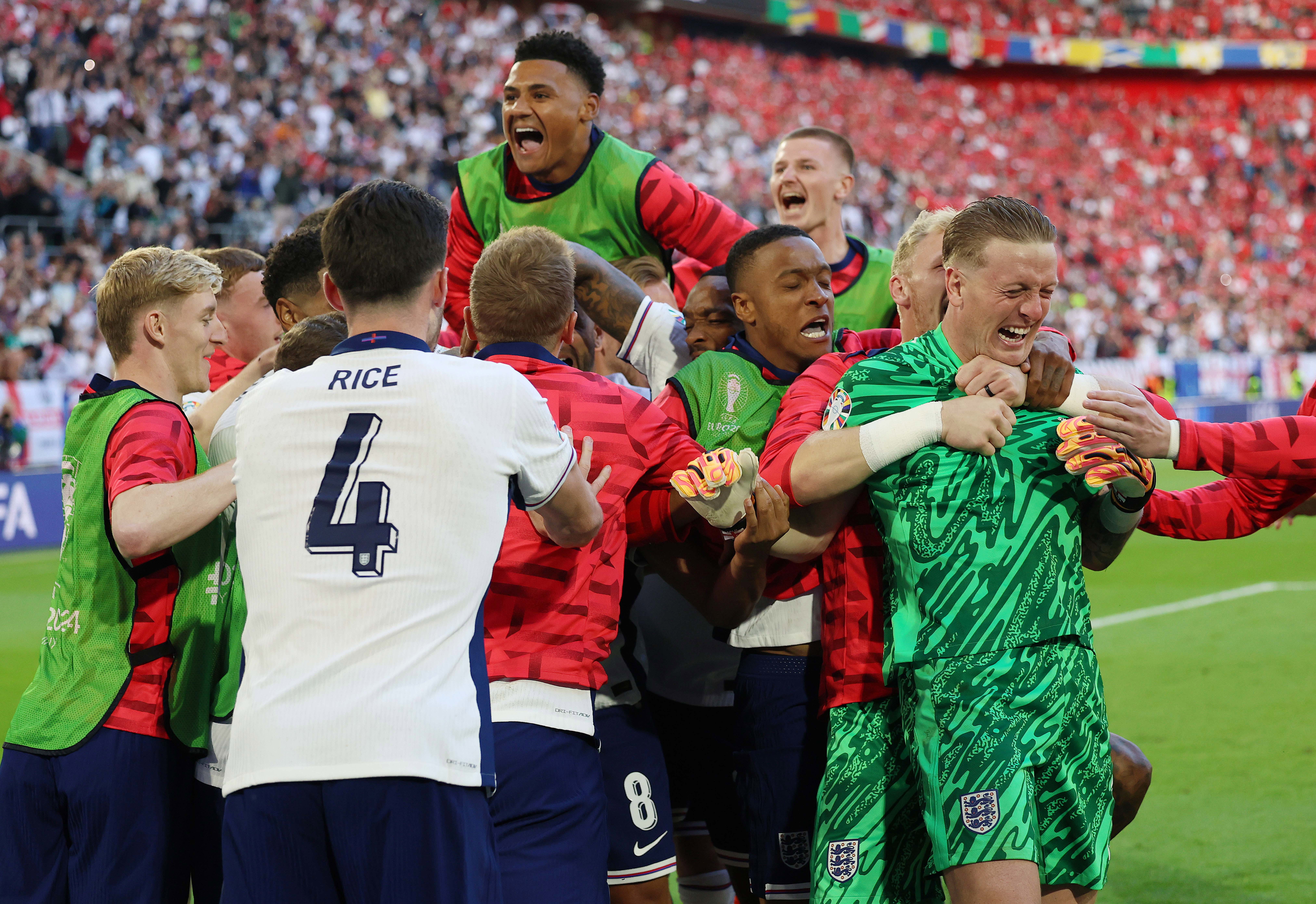 England players celebrate the penalty shoot out victory during the UEFA EURO 2024 quarter-final match between England and Switzerland at Dusseldorf Arena on July 6, 2024 in Dusseldorf, Germany. (Photo by Crystal Pix/MB Media/Getty Images)