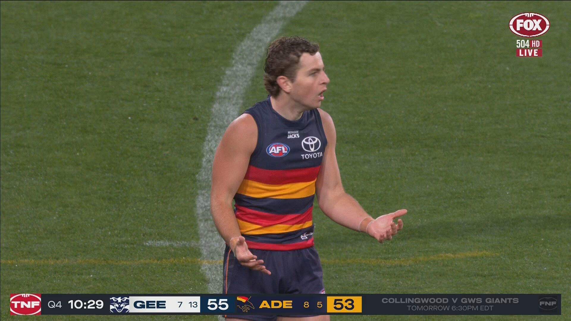 Crows player Zac Taylor reacts to the dud call.