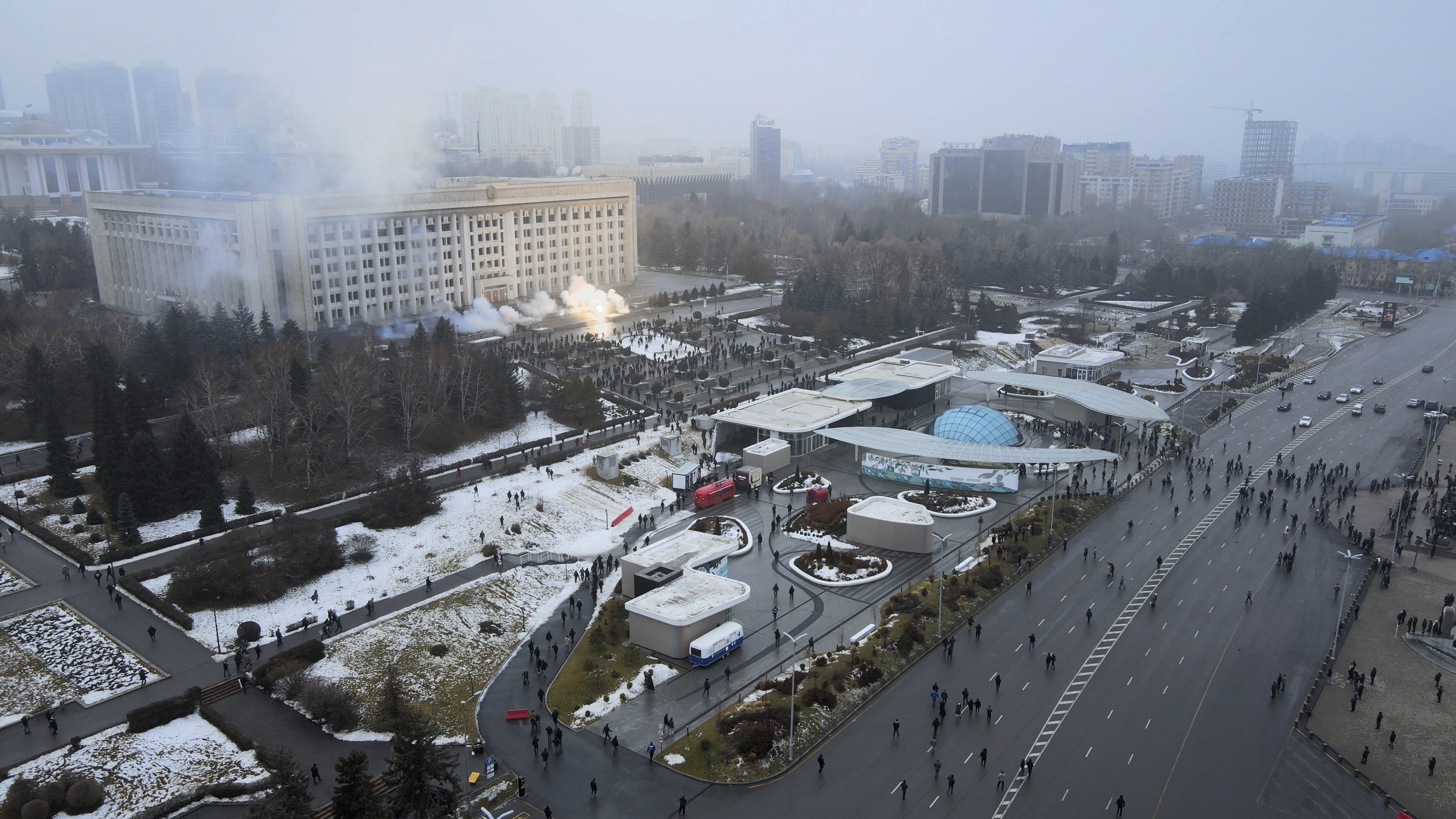 Smoke rises from the city hall building during a protest in Almaty, Kazakhstan, Wednesday, Jan. 5, 2022.