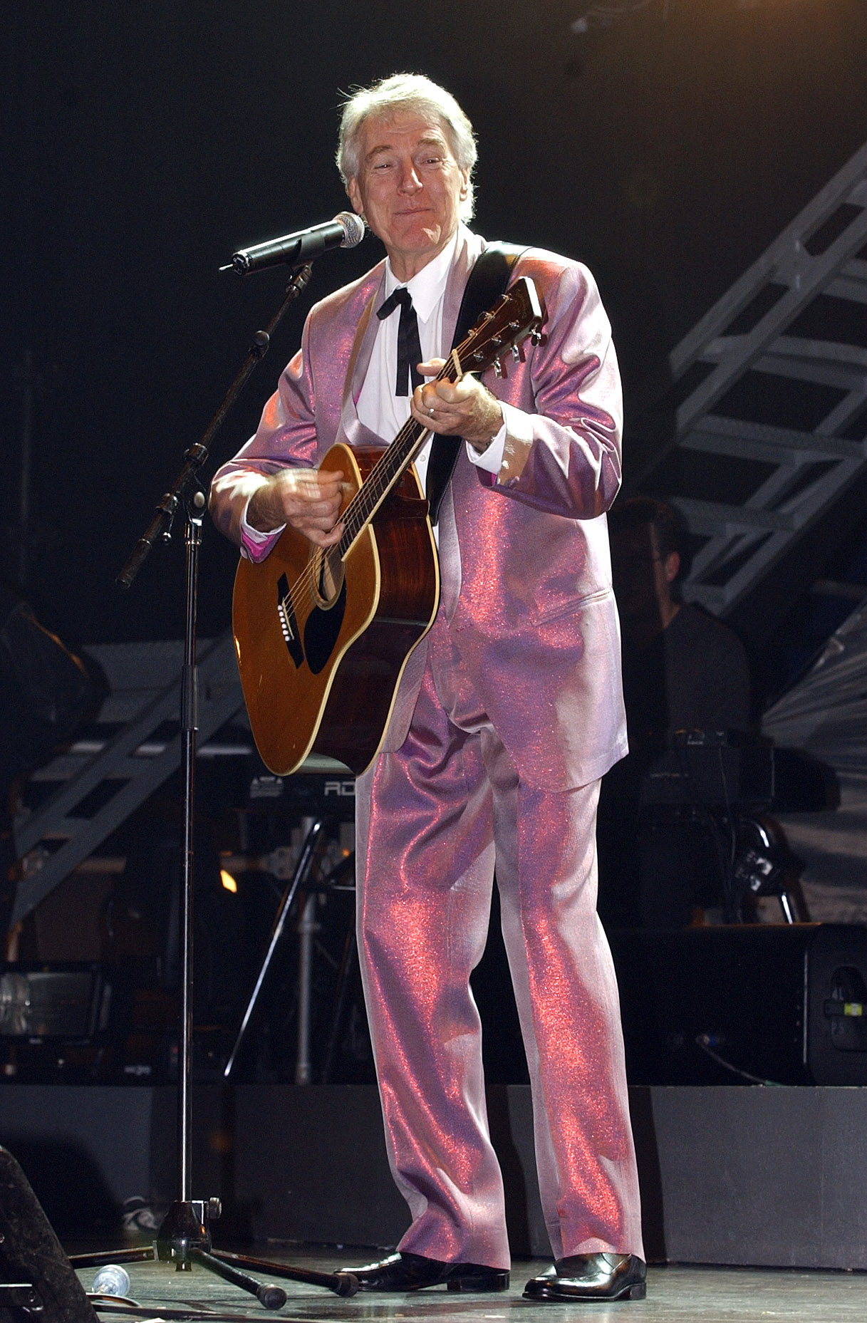 Col Joye performs live on stage during dress rehearsals for the 'Long Way To The Top' concert tour at Burswood Dome on August 23, 2002 in Perth, Australia. 