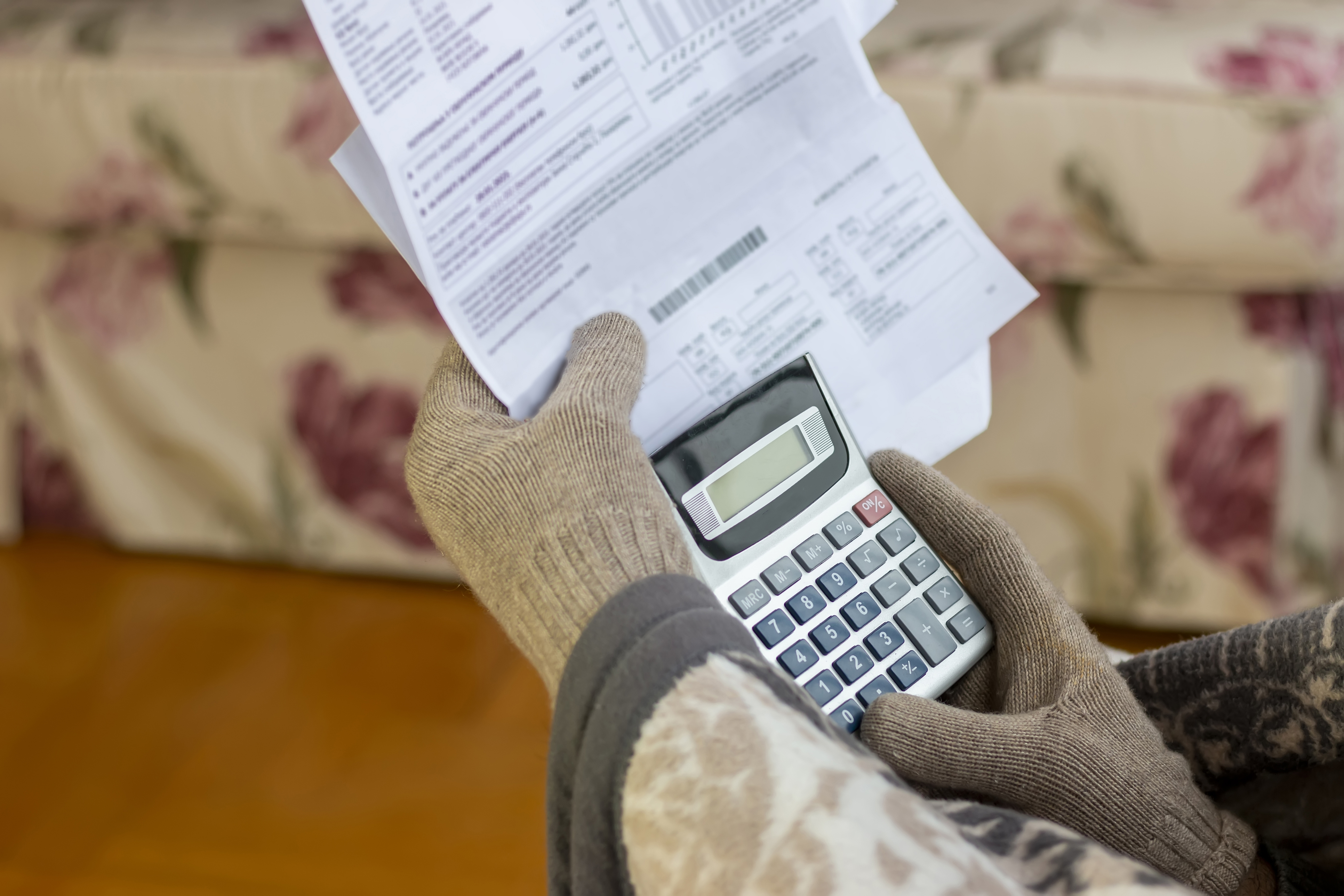 Worried mature man reading power cut notification letternews,  holding heating bill, He is confused and astonished by unbelievable news: high bill tax invoice, debt notification, bad financial report, money problem