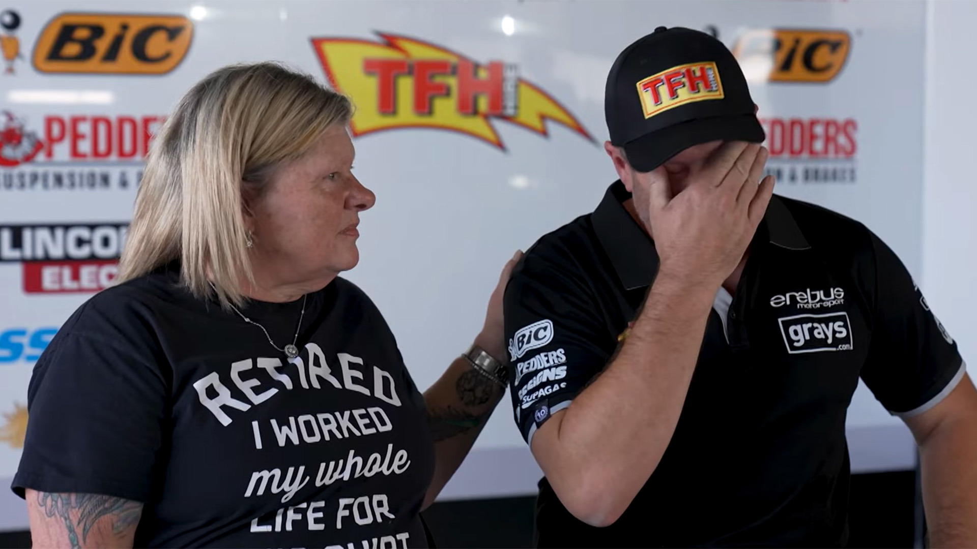 Erebus Motorsport owner Betty Klimenko (left) consoles team CEO Barry Ryan.