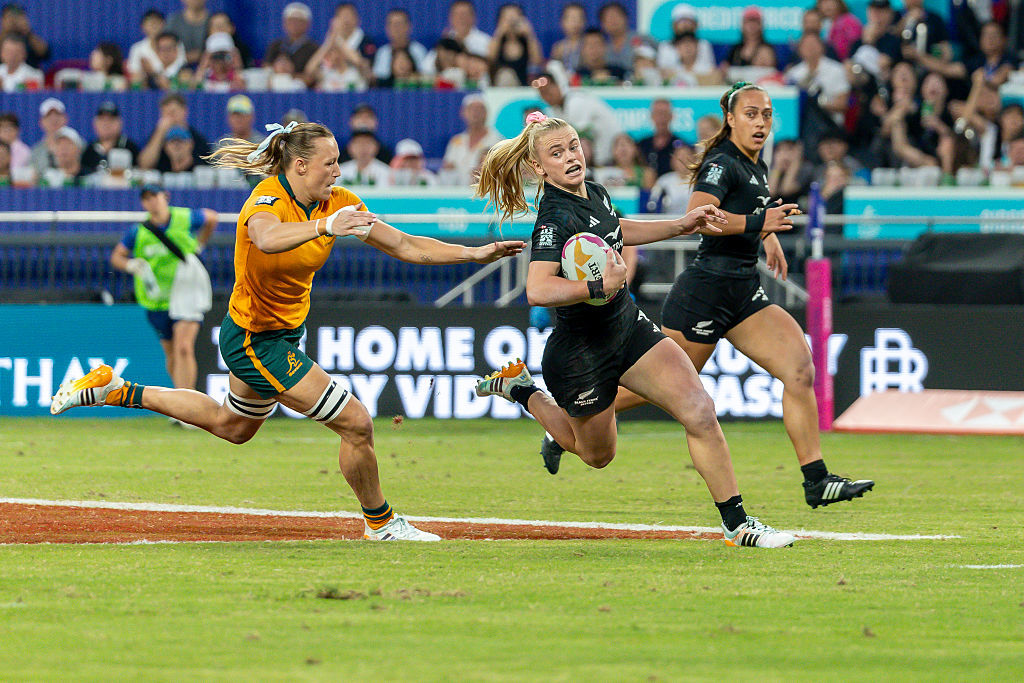 Jorja Miller of New Zealand runs with the ball during the women's cup final.