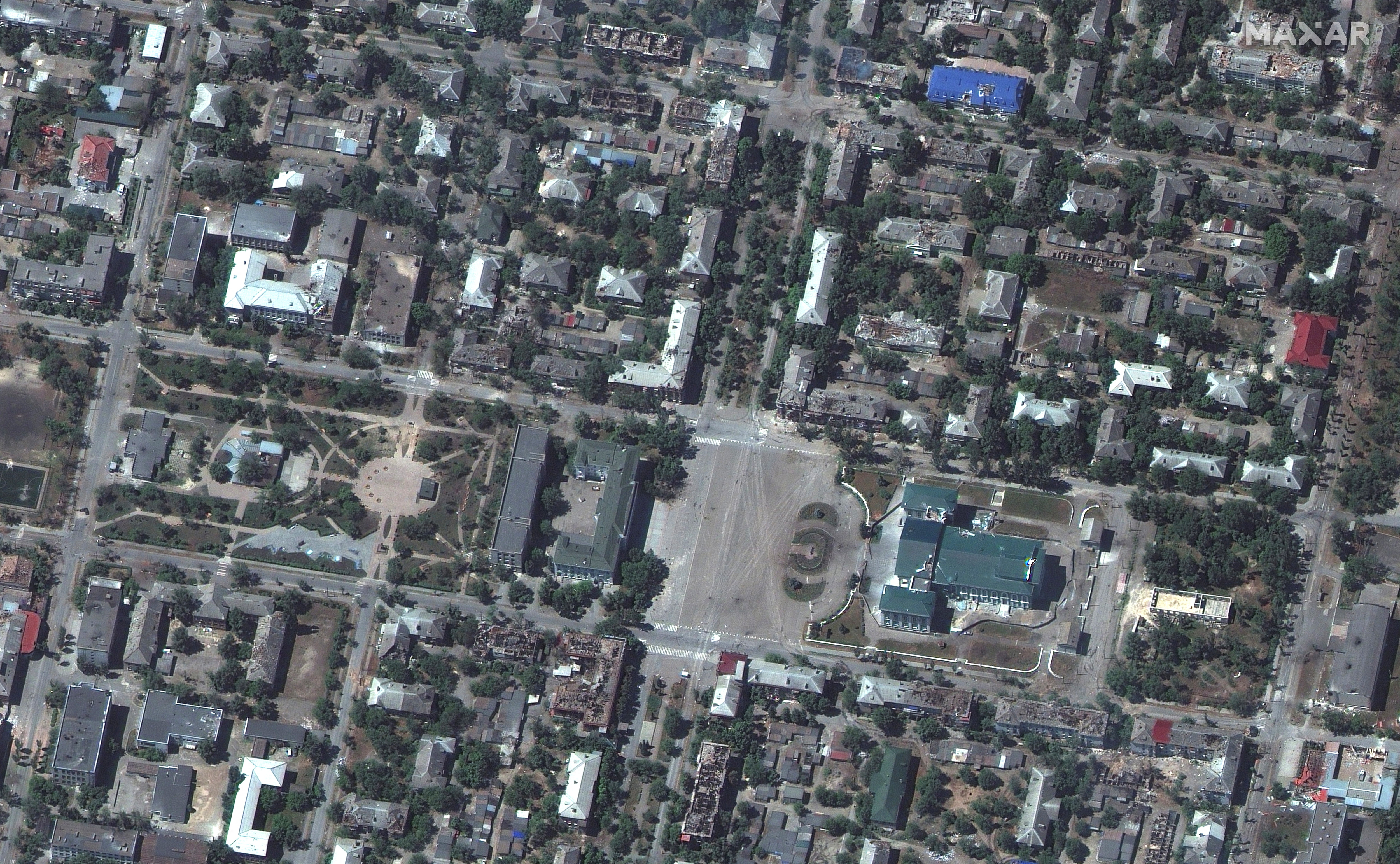 A satellite image shows damaged buildings near Chemist's Palace of Culture in downtown Severodonetsk, Ukraine.