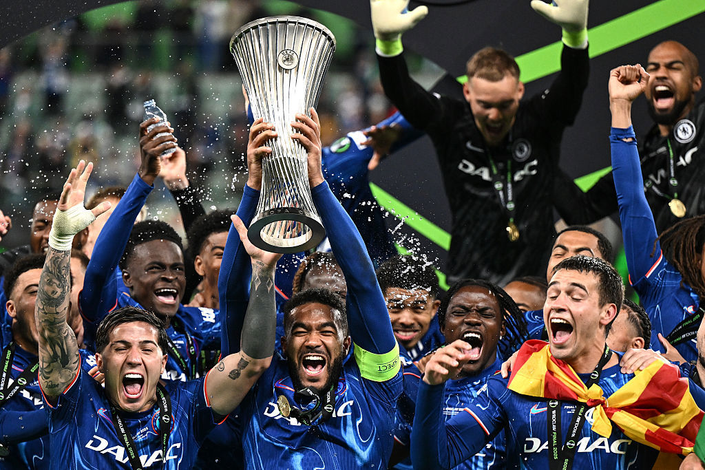 Chelsea celebrates with the trophy at the end of the UEFA Conference League final.