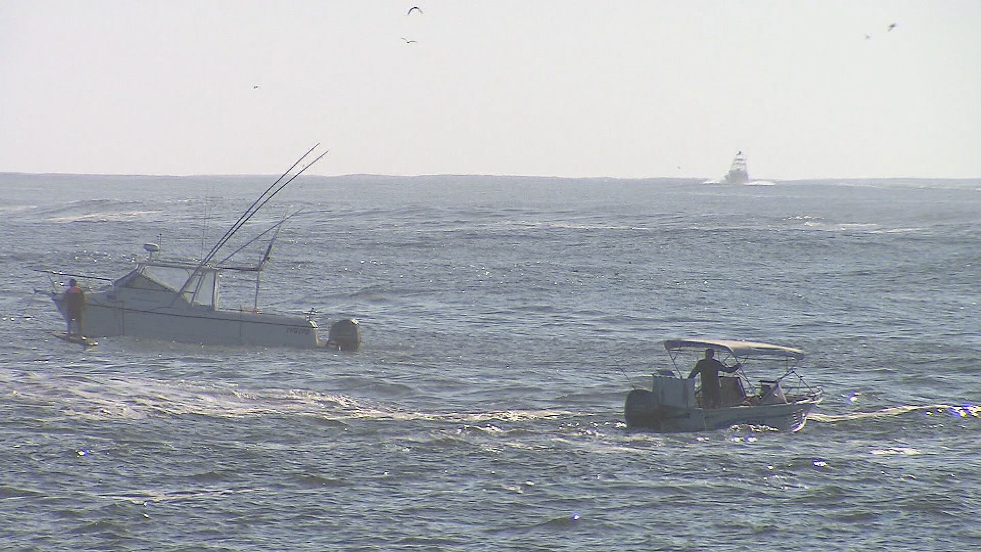A second boat has capsized off the Gold Coast Seaway in as many days after a father and son were smashed by a powerful swell.