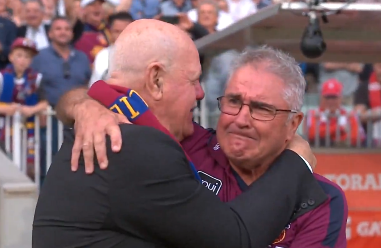 Chris Fagan in tears as he hugs Leigh Matthews after winning the 2024 grand final.