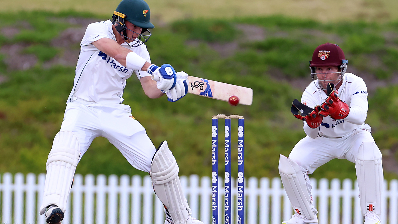 Tim Ward cuts for Tasmania in their Sheffield Shield match against Queensland.