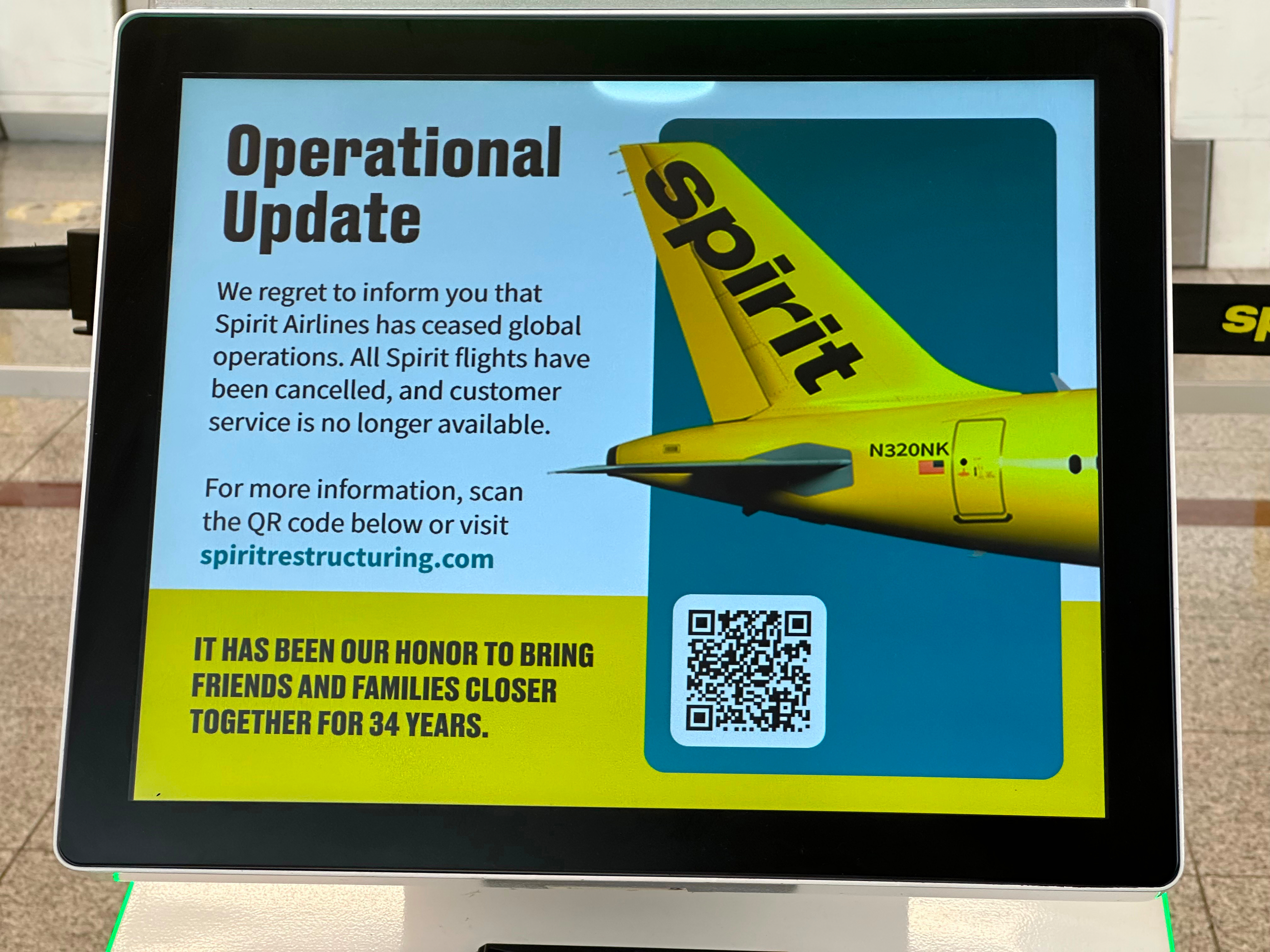 An electronic check-in kiosk announces Spirit Airlines shutdown on Saturday, May 2, 2026 at Hartsfield-Jackson Atlanta International Airport in Atlanta. (AP Photo/Jeff Amy)