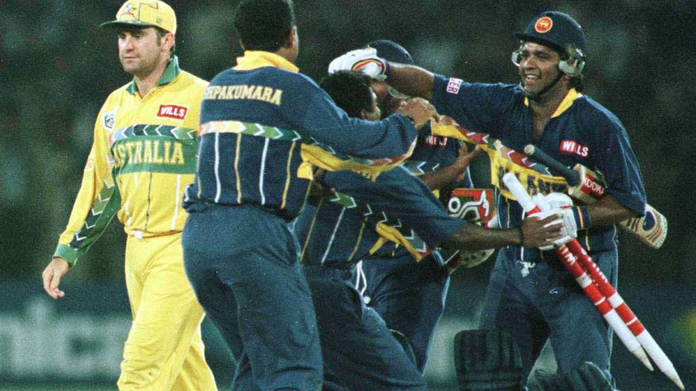 Sri Lankan players celebrate their 1996 World Cup win while a dejected Mark Taylor looks on.