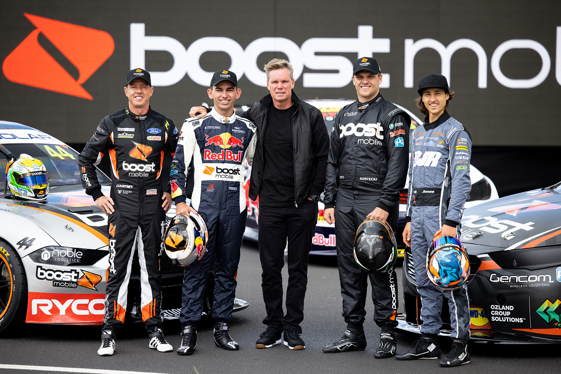 Boost Mobile founder Peter Adderton (middle) with James Courtney (from left), Broc Feeney, Brodie Kostecki, and Macauley Jones.