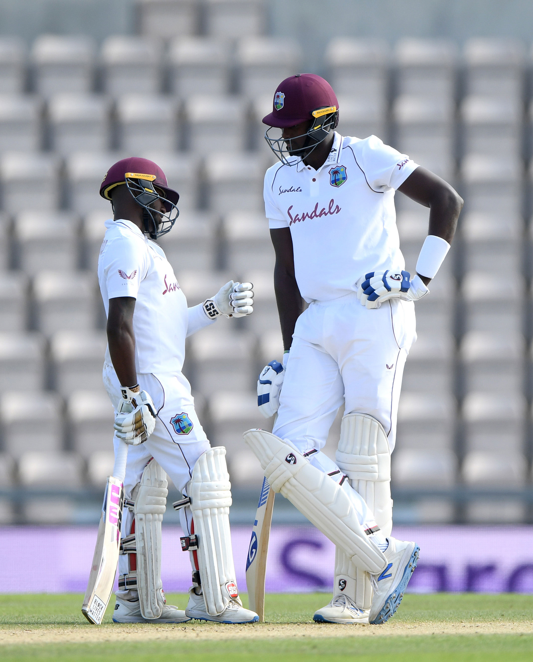 Jason Holder (right) with Jermaine Blackwood.