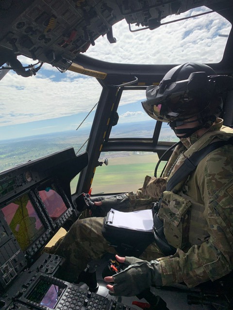 Max Nugent flying a helicopter