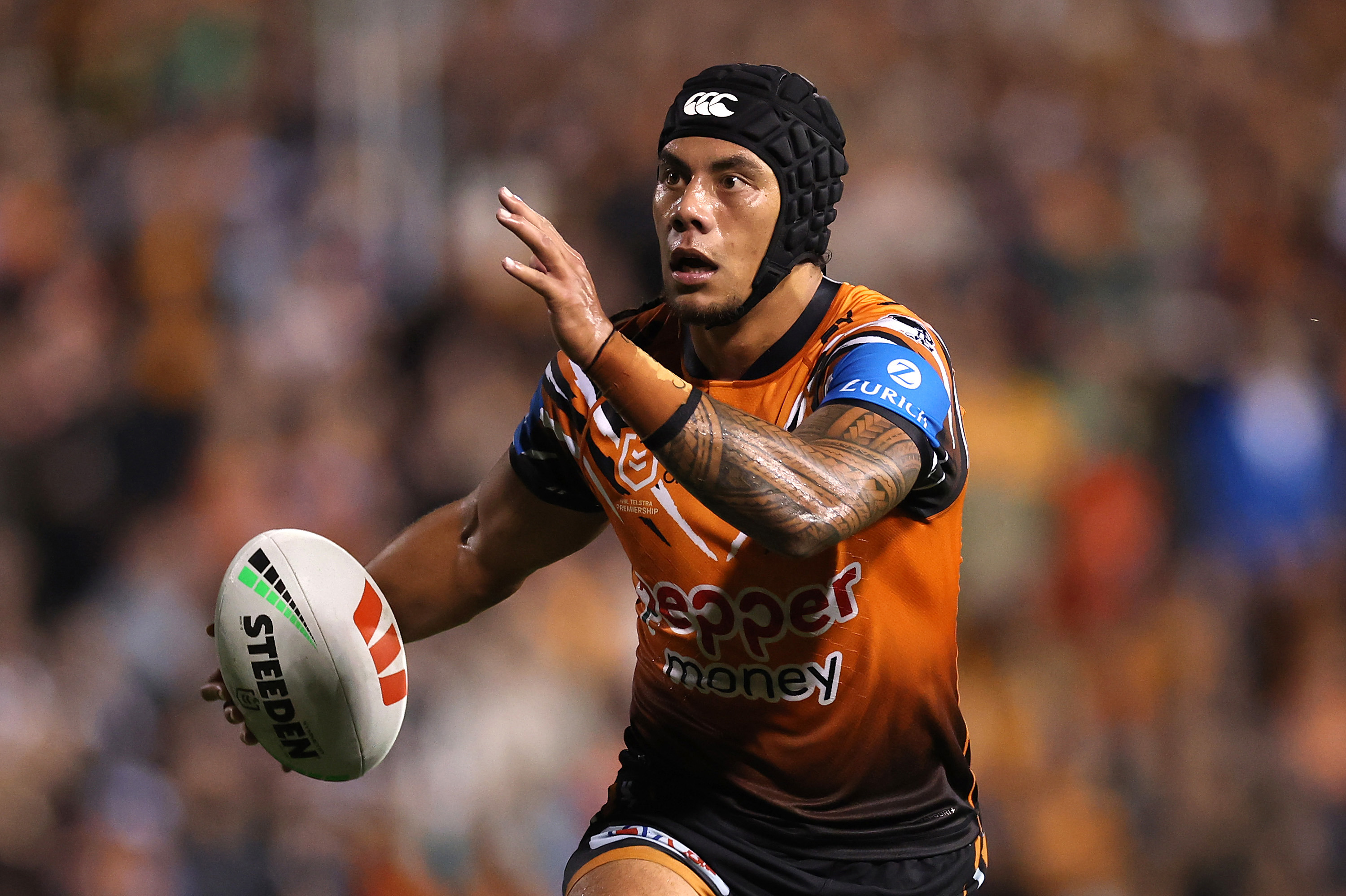 SYDNEY, AUSTRALIA - APRIL 23: Jarome Luai of the Wests Tigers runs the ball during the round eight NRL match between the Wests Tigers and Canberra Raiders at Leichhardt Oval on April 23, 2026 in Sydney, Australia. (Photo by Cameron Spencer/Getty Images)