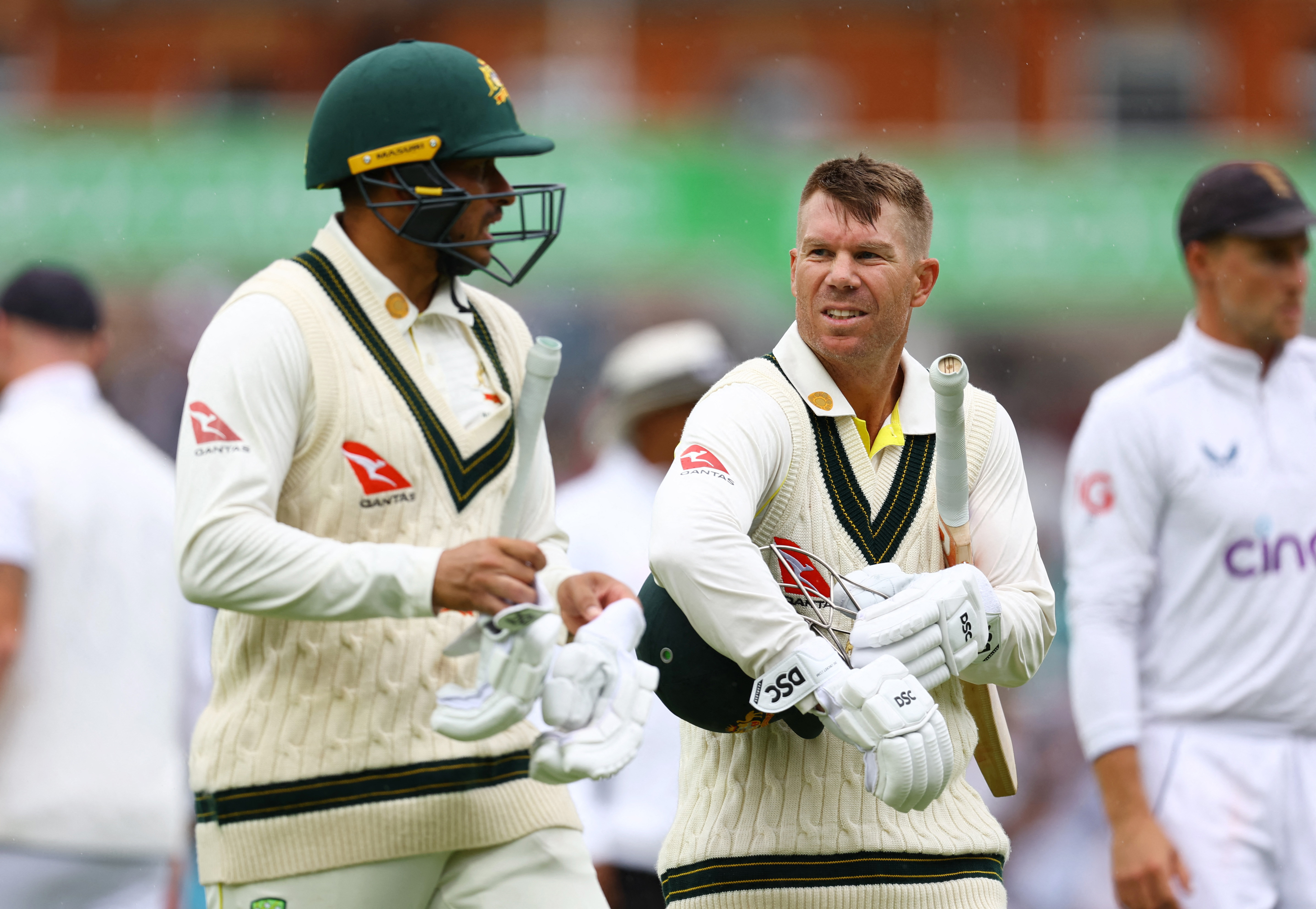 Australia's David Warner and Usman Khawaja leave the field at The Oval.