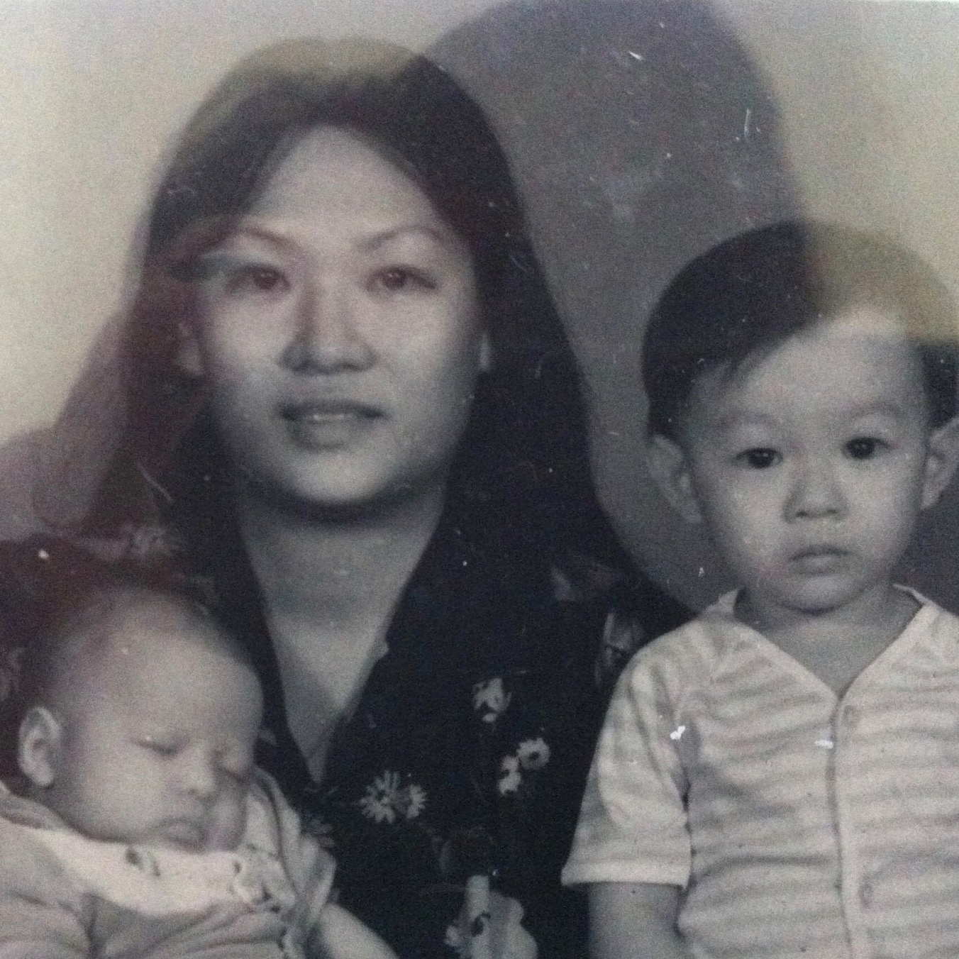 Brothers Nee (left) and Nick (right), pictured with their mother Khuc Phan Ta, shortly after their arrival in Australia as refugees.