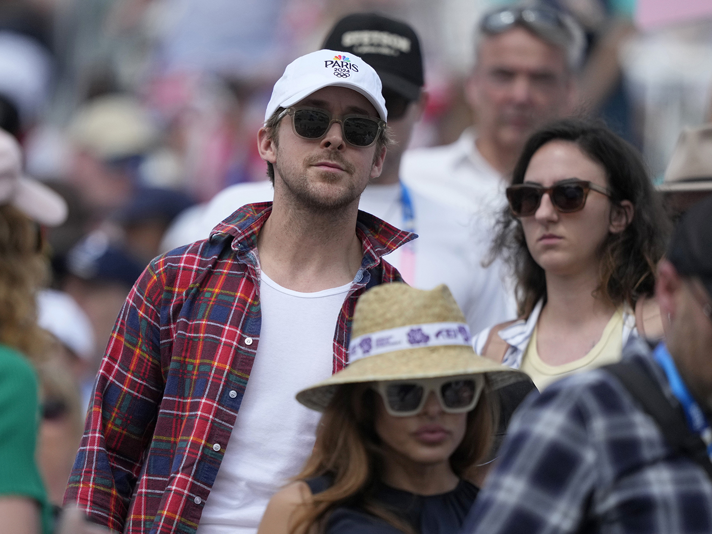 Eva Mendes and Ryan Gosling attend the dressage Individual Grand Prix Freestyle at the 2024 Summer Olympics, August 4, 2024, in Versailles, France. 