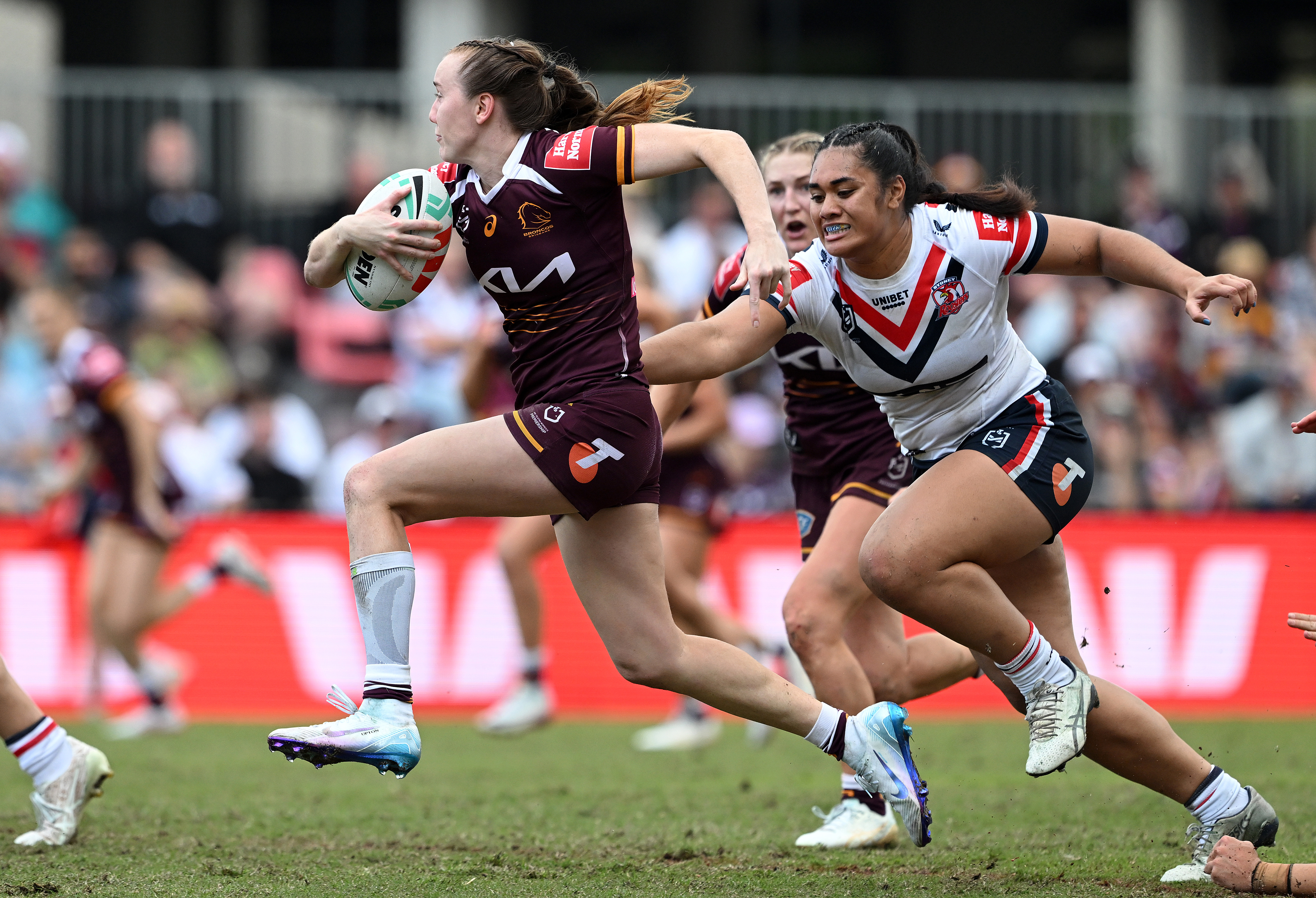 Broncos star Tamika Upton breaks through the defence during the match against the Roosters.