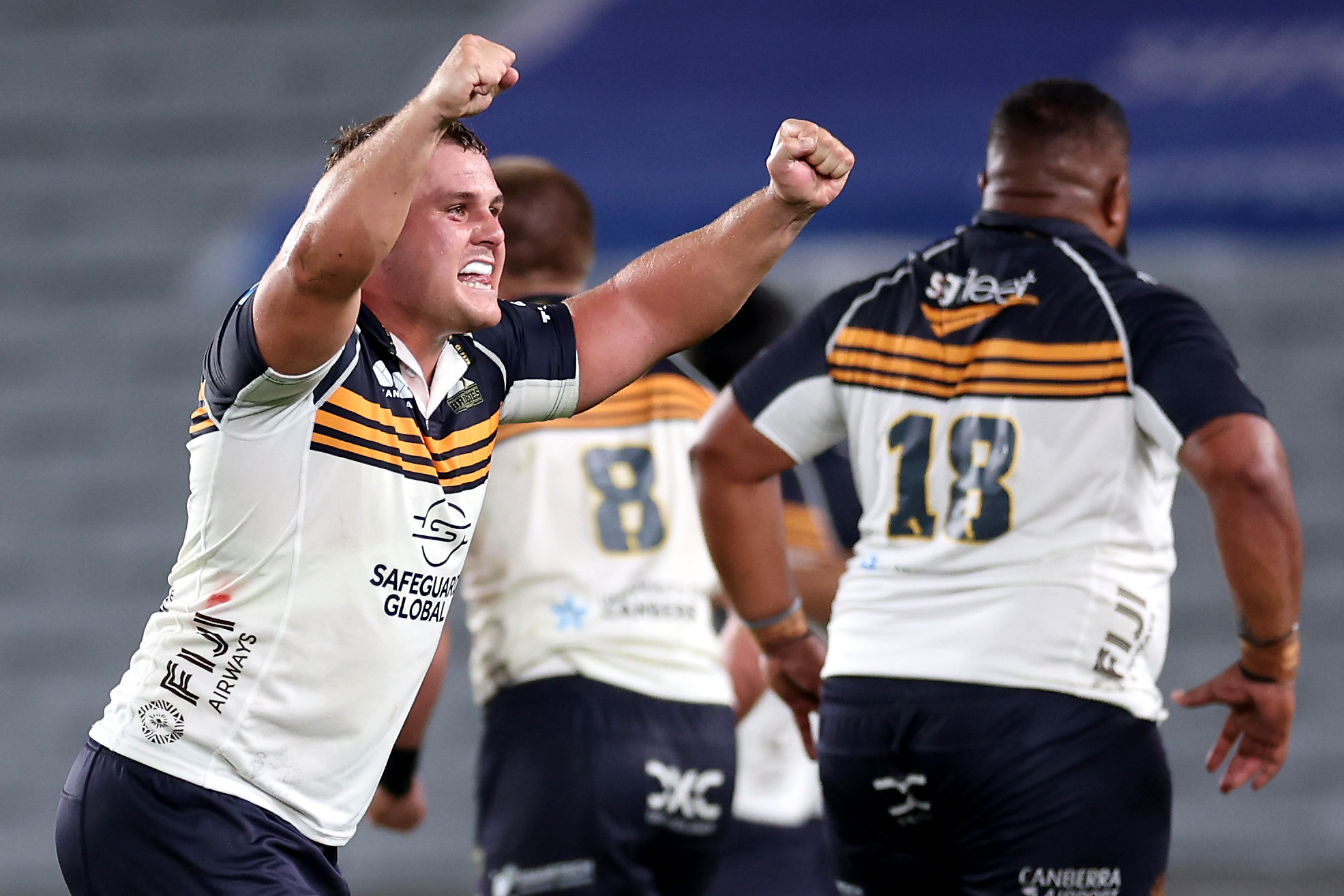Blake Schoupp of the Brumbies celebrates on fulltime.